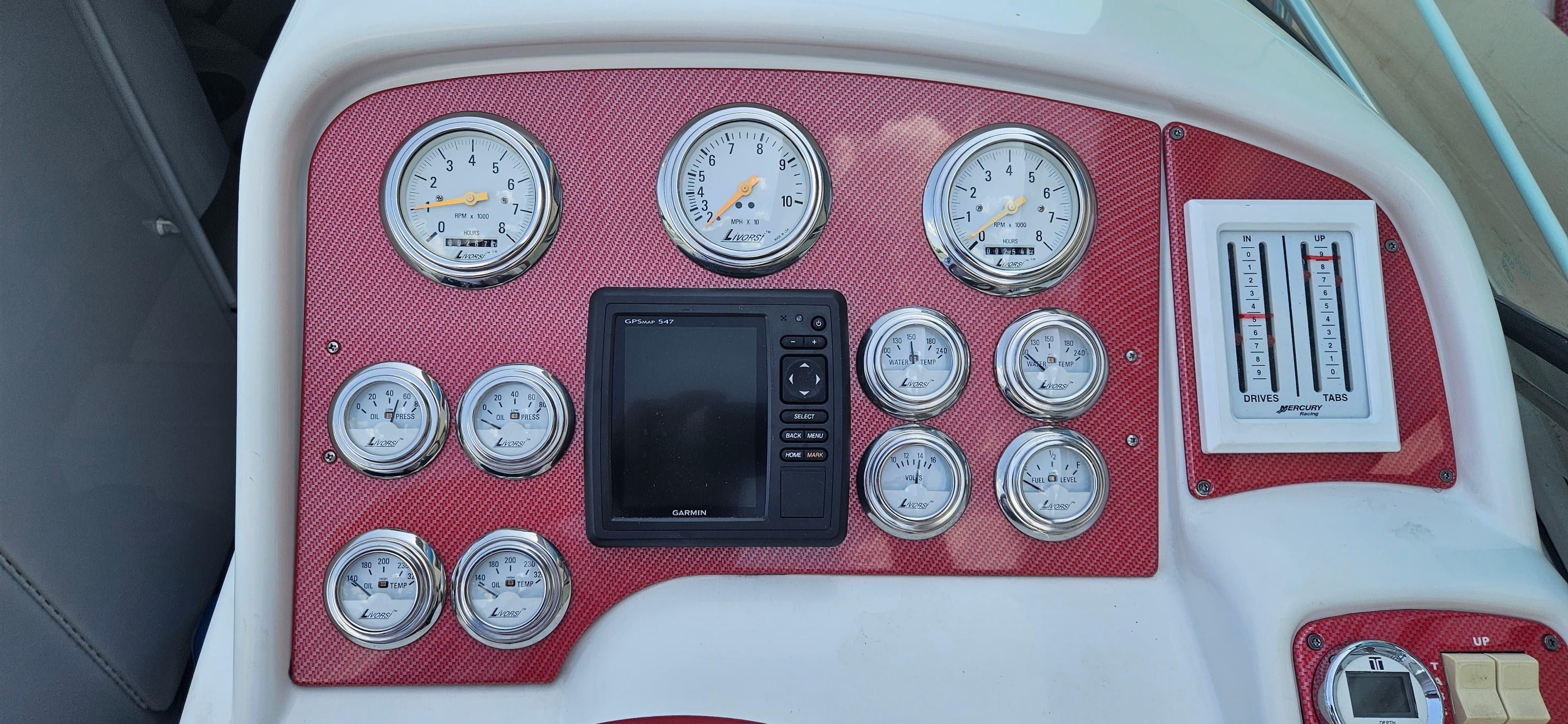 Dashboard of 2004 Formula 382 FASTech boat with gauges and controls.