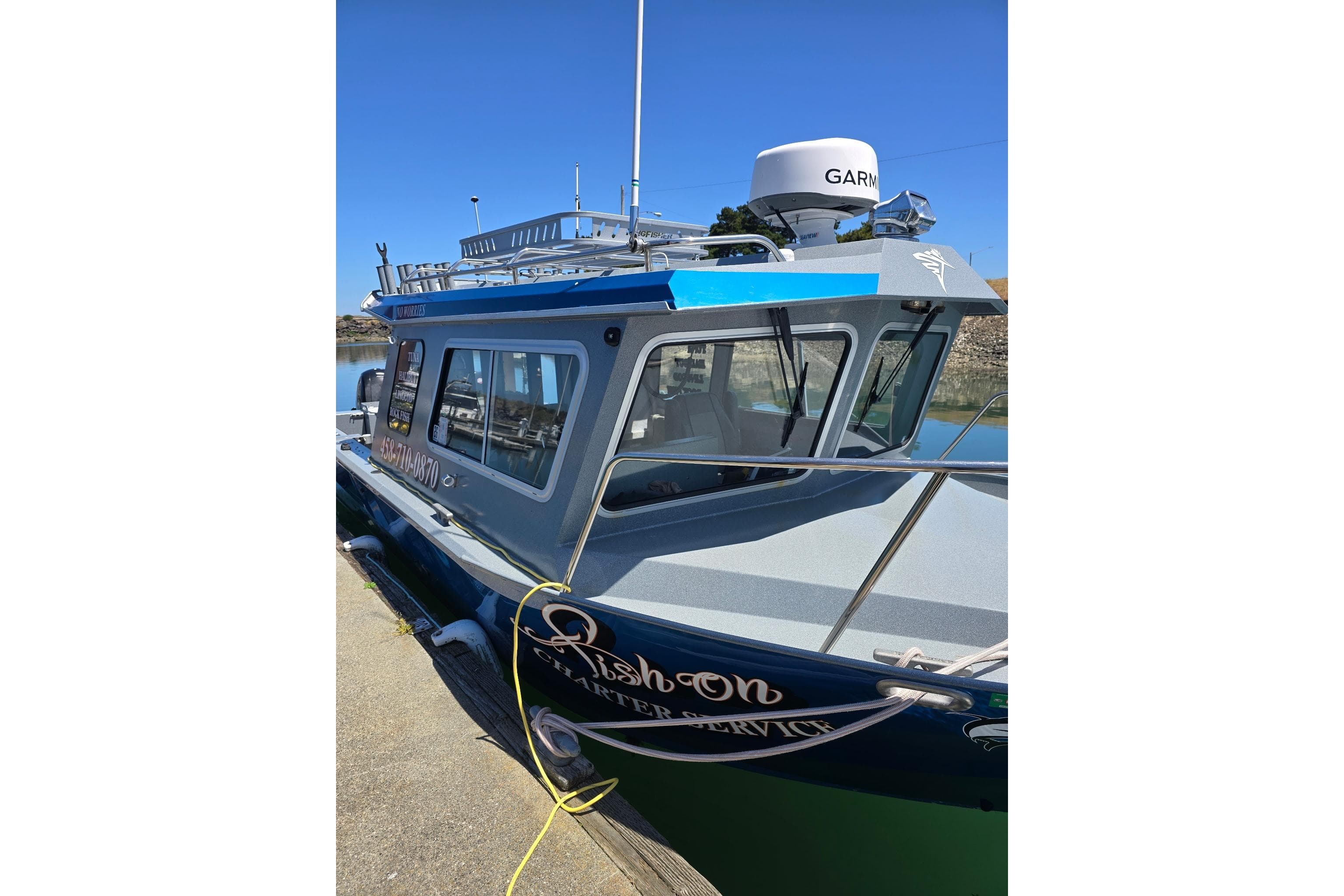 2021 KingFisher 2825 Coastal Express boat docked, featuring Garmin equipment.