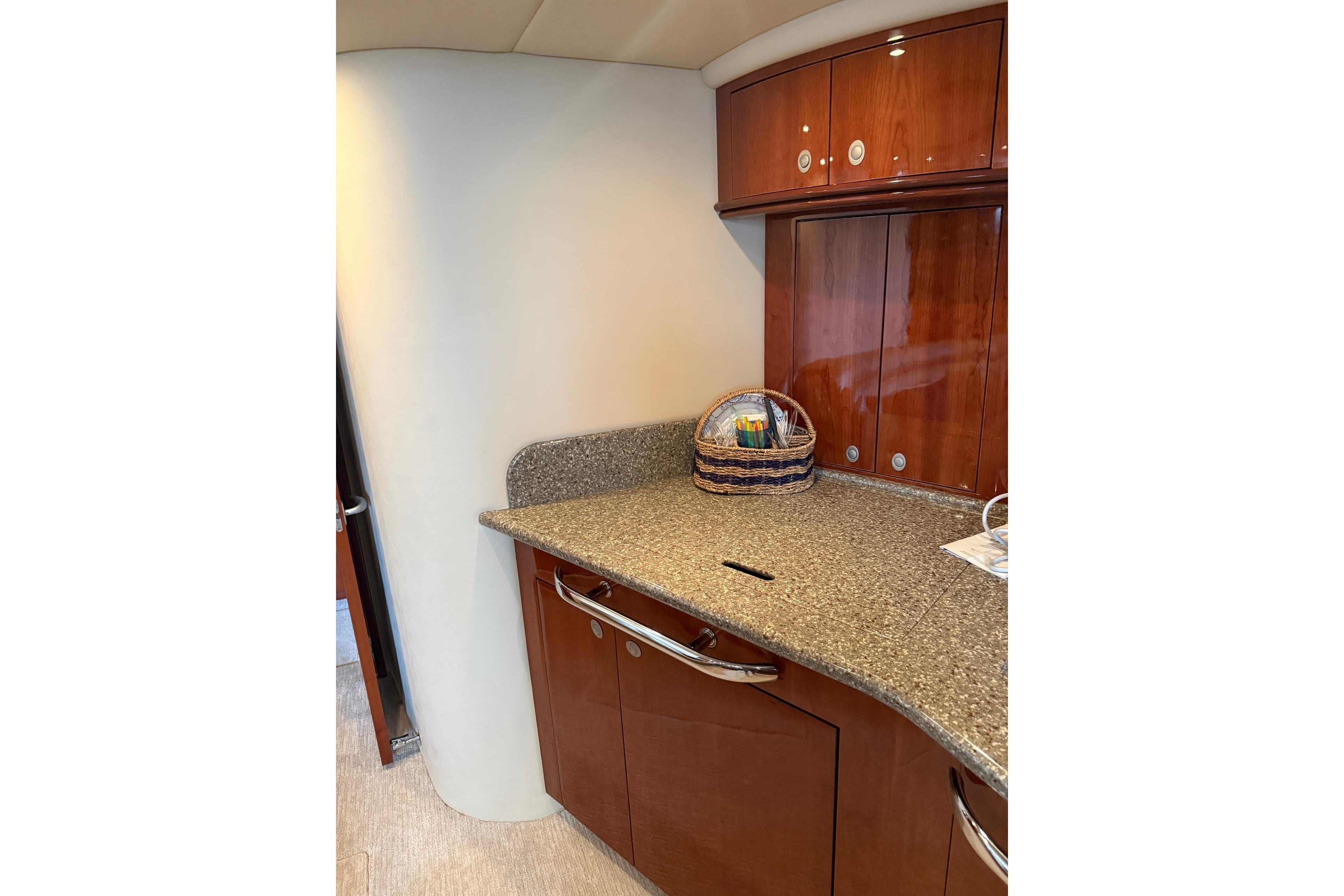 Luxurious 2004 Sea Ray 550 Sundancer yacht interior with elegant wood cabinetry.