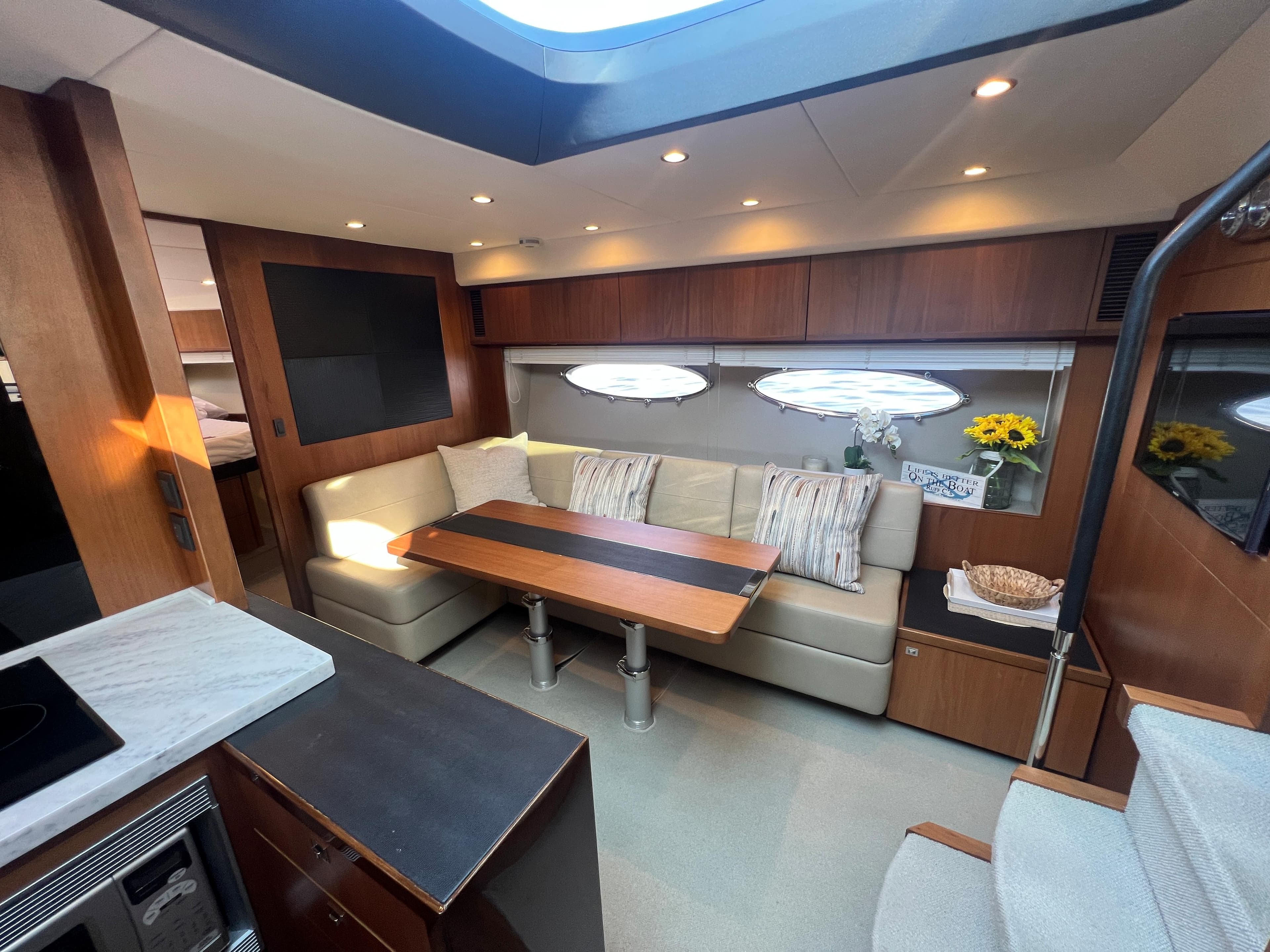 Luxurious interior of 2015 Viking Princess V52 yacht with elegant seating and modern decor.