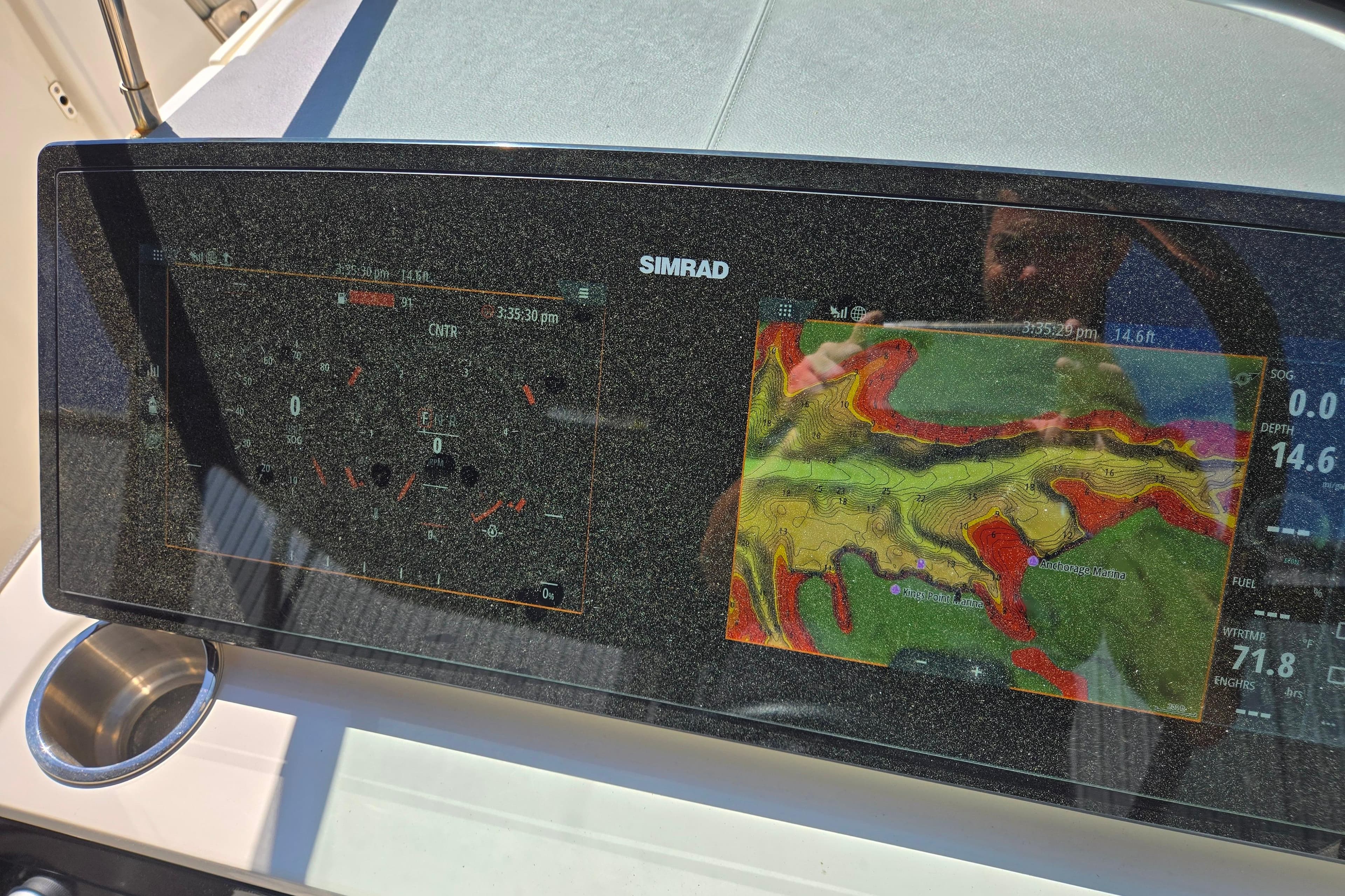 Simrad navigation display on 2022 Sea Ray SLX 280 boat dashboard.