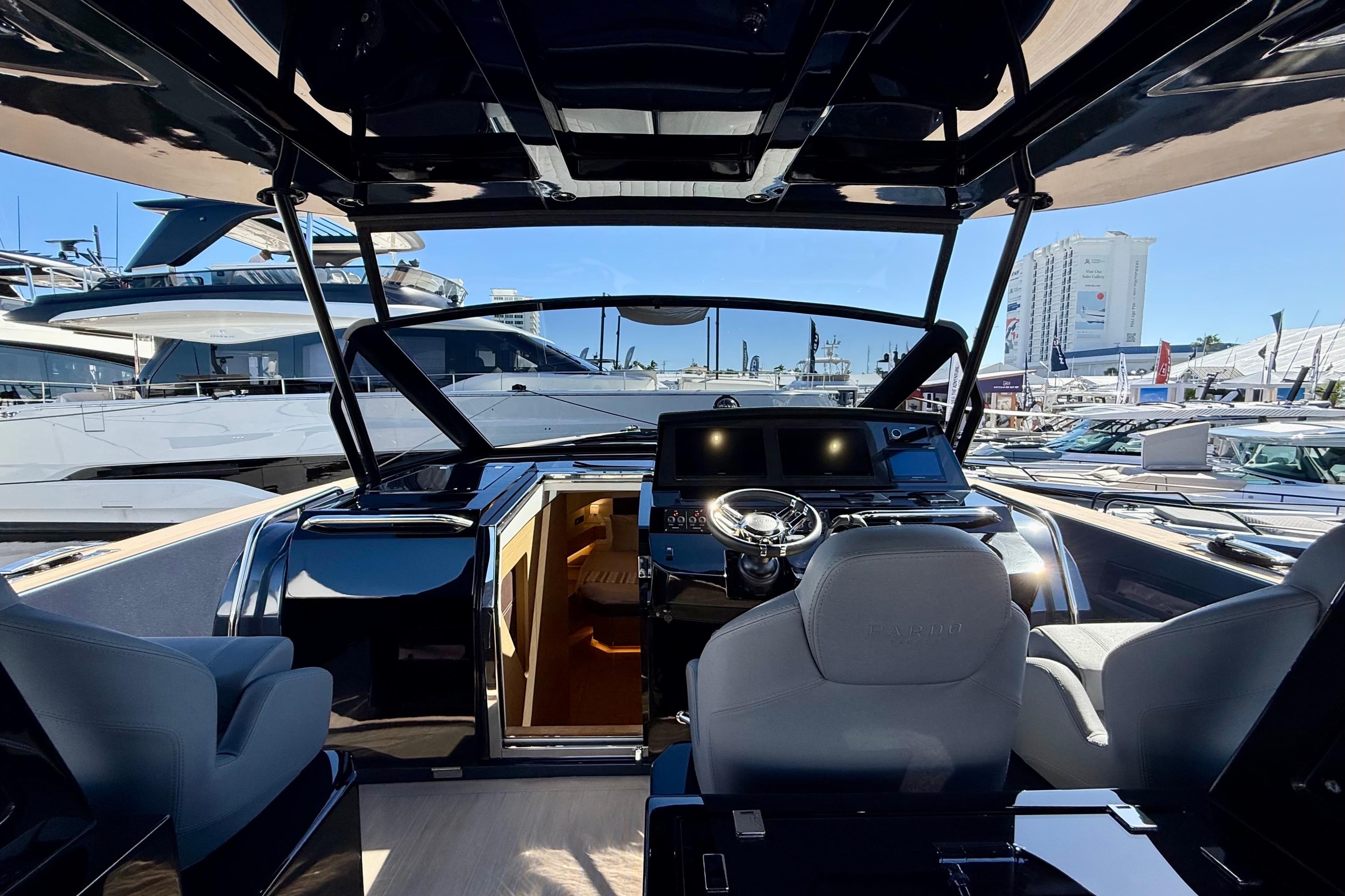 Interior view of 2026 Pardo Yachts 50, showcasing modern helm and luxurious seating.