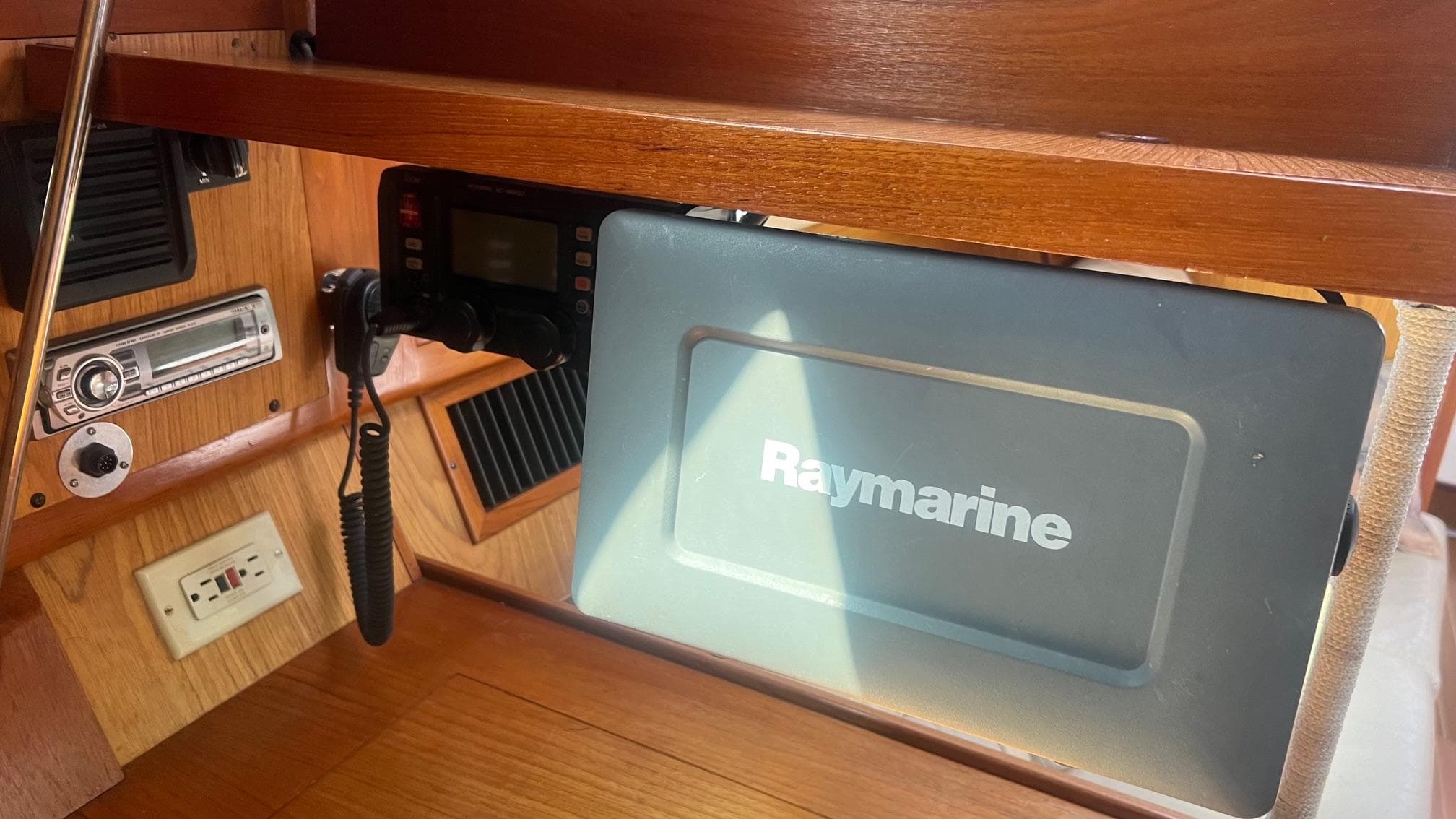 Interior of a 2000 Hunter 410 sailboat with Raymarine navigation equipment.