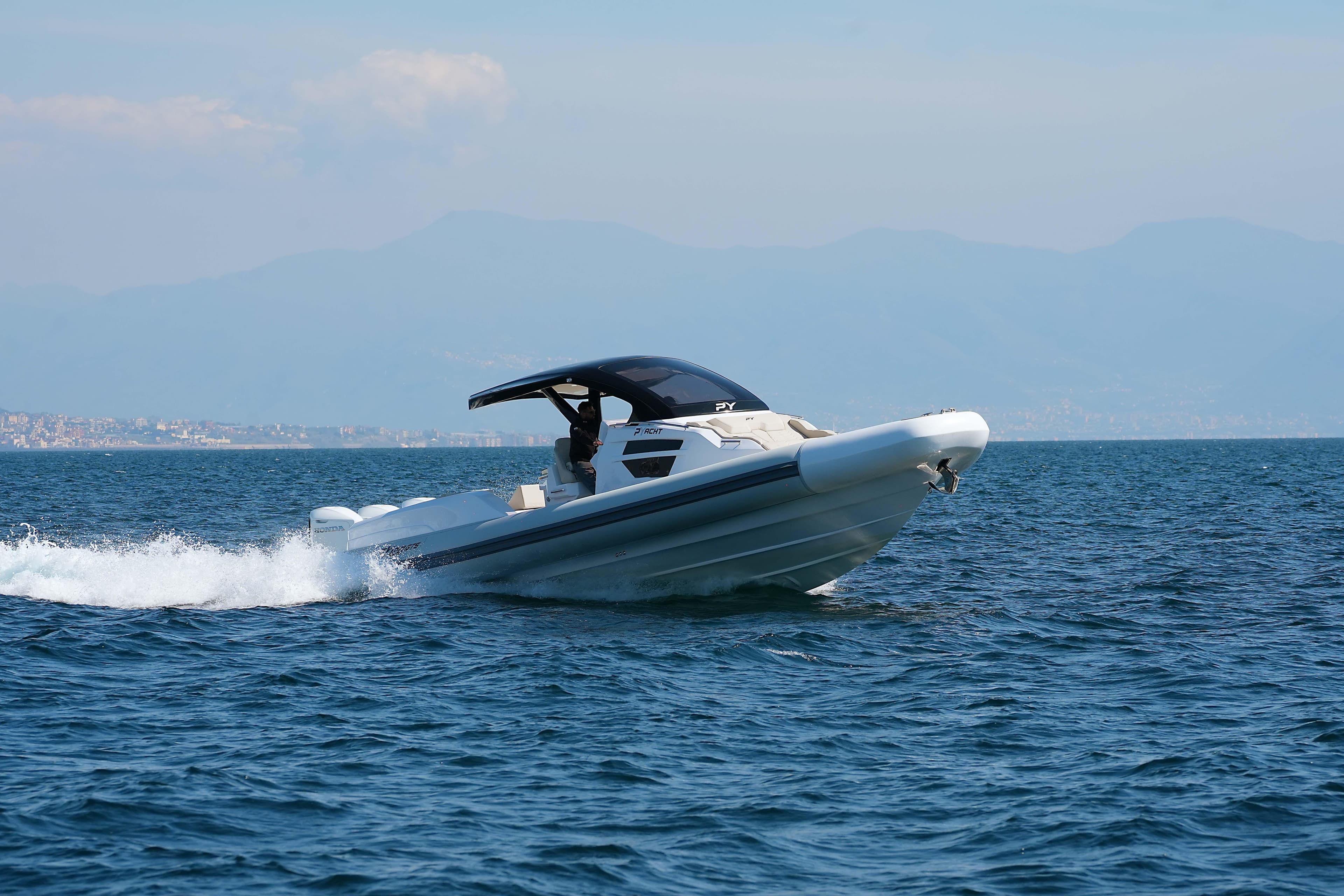 2026 PYACHT PY 120 GTS cruising on open water, showcasing sleek design and performance.