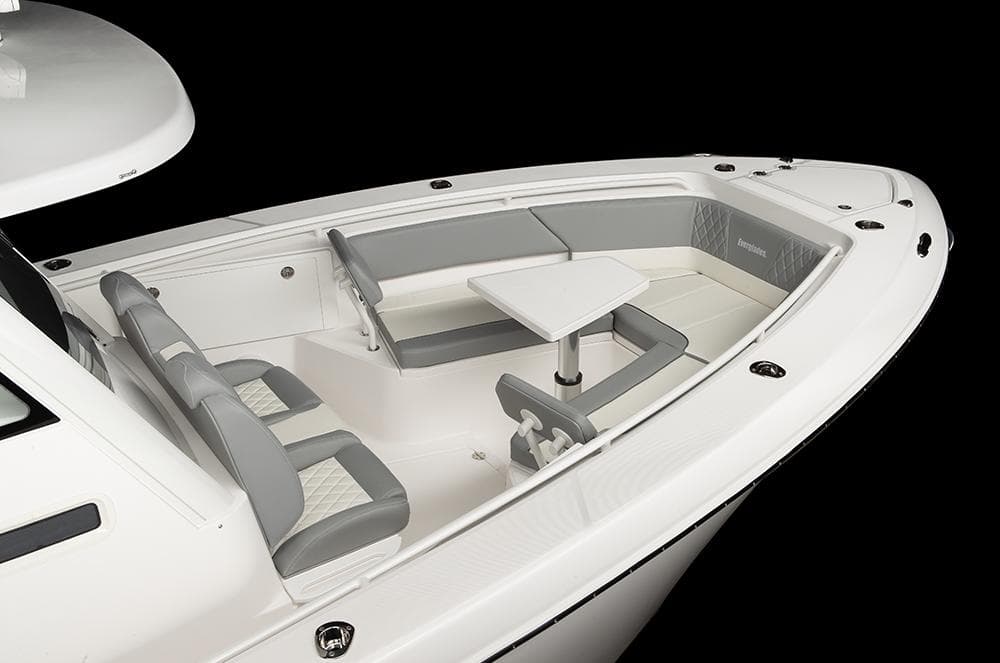 Manufacturer Provided Image: 2025 Everglades 335 Center Console boat with sleek seating and table design.