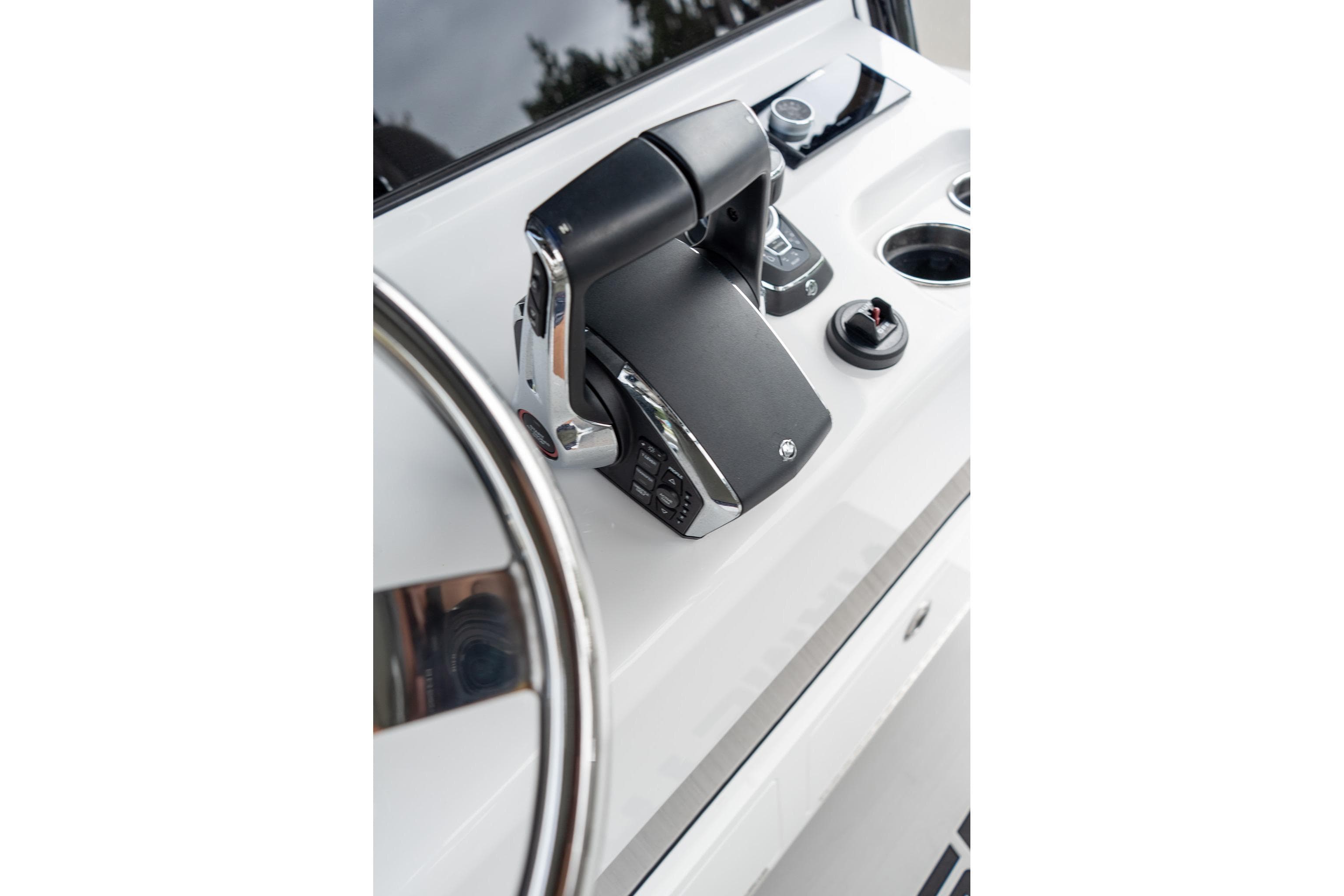 2025 Sportsman Open 322 Center Console boat controls and steering wheel.