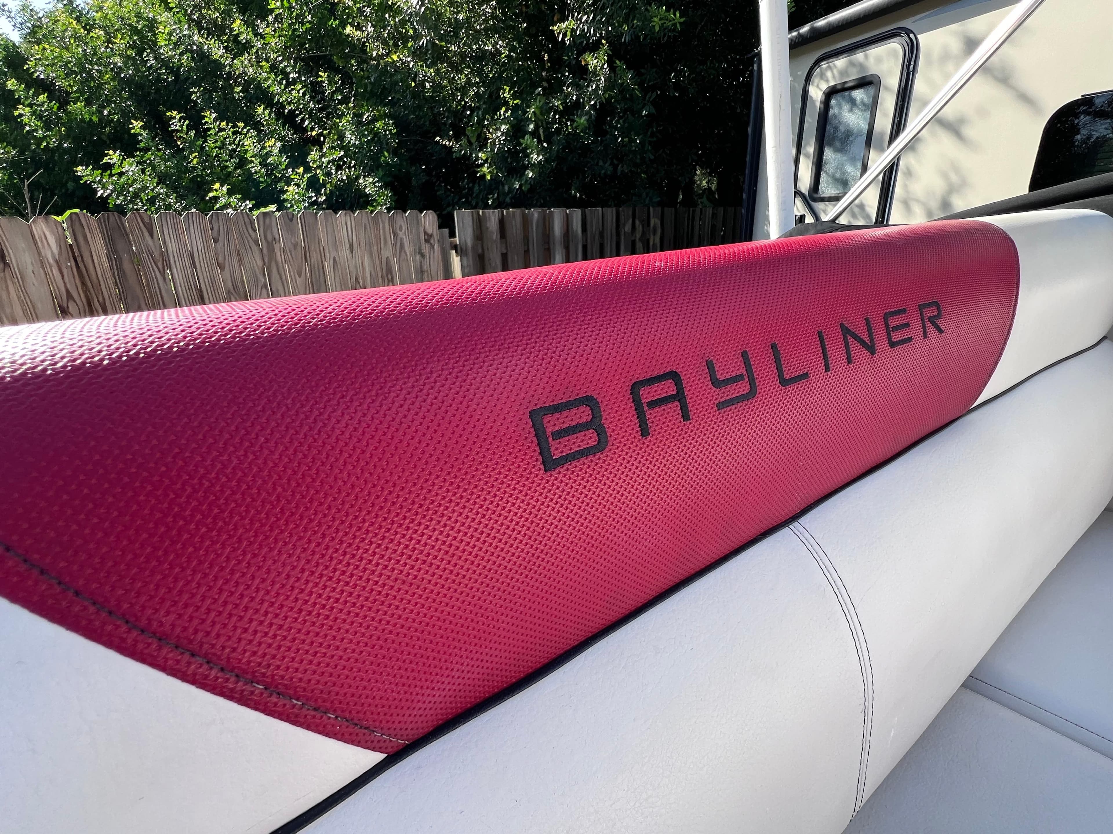 2016 Bayliner 195 Deck Boat red and white interior detail.