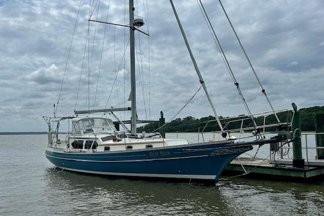 2016 Gozzard 41 RC sailboat docked on a cloudy day.