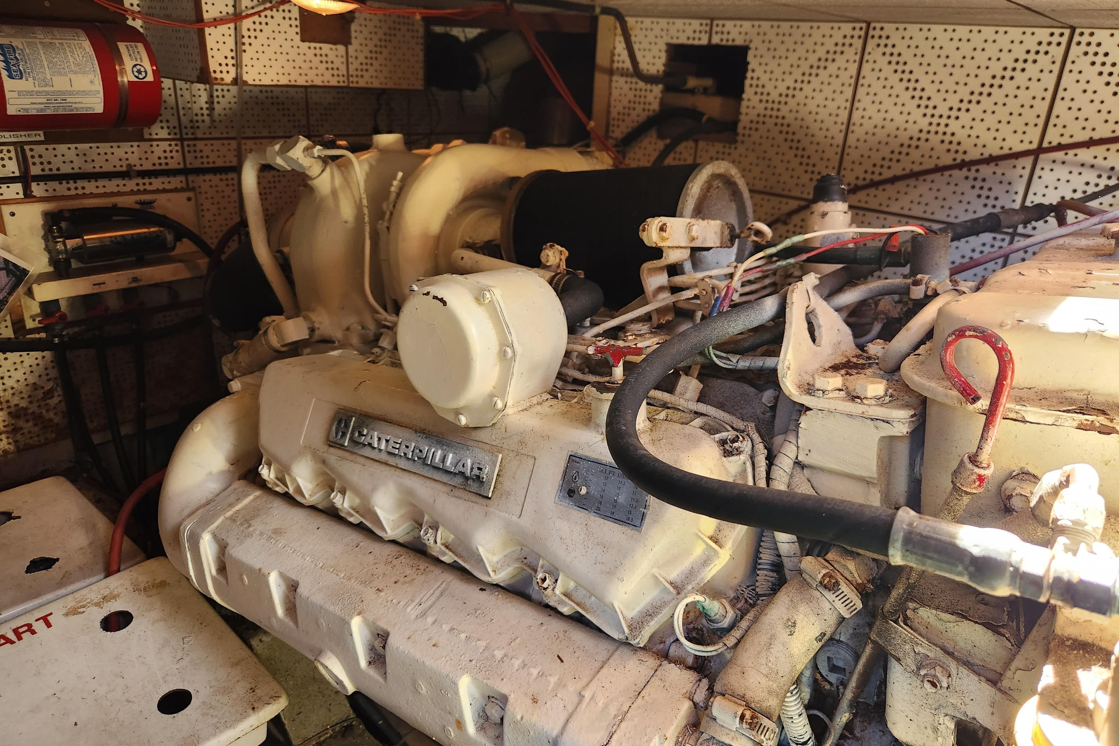 Engine room of 1987 Jefferson 42 SE Sundeck Motor Yacht with Caterpillar engine.