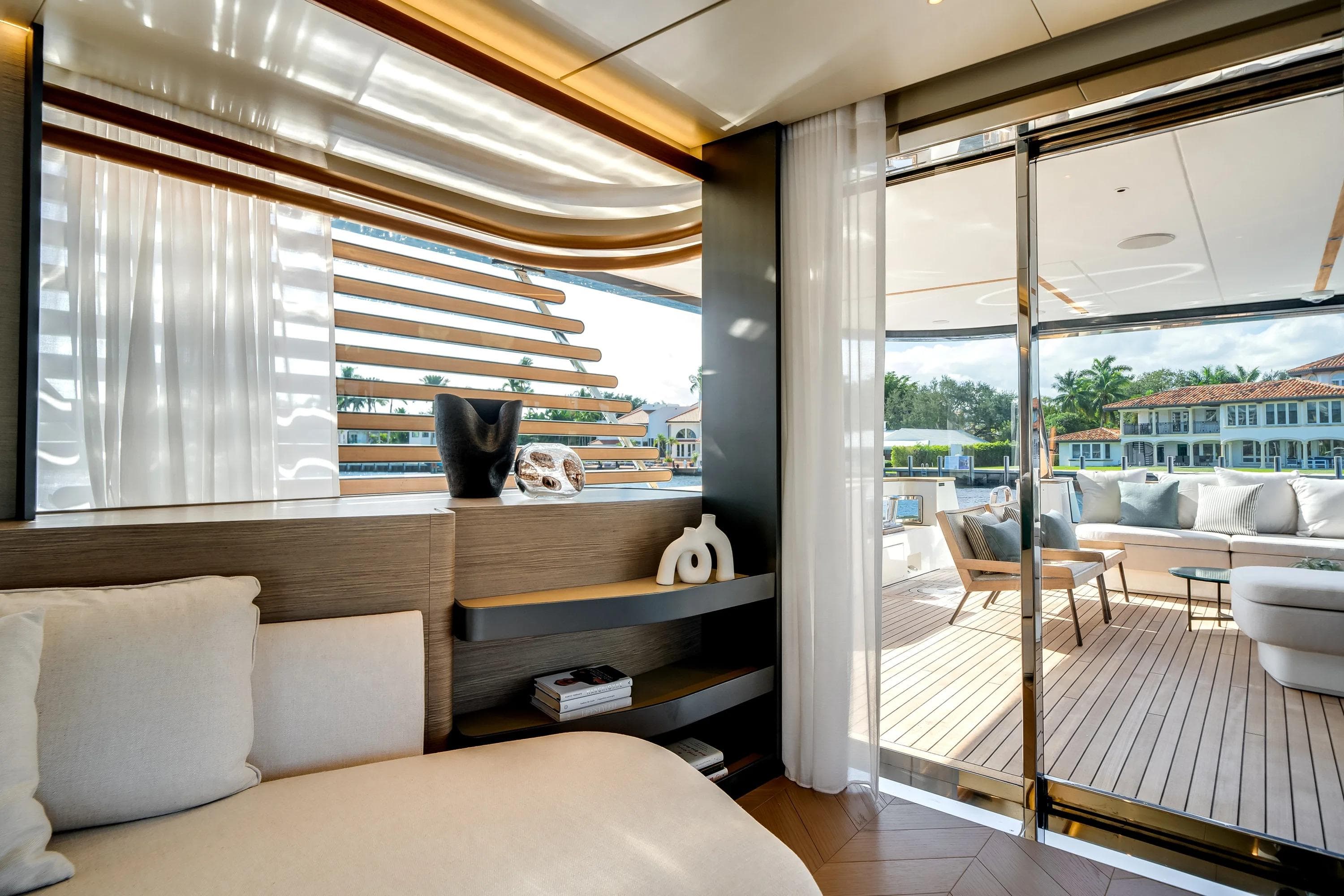 Luxurious interior of 2026 Azimut Magellano 30M yacht with elegant decor and spacious deck.