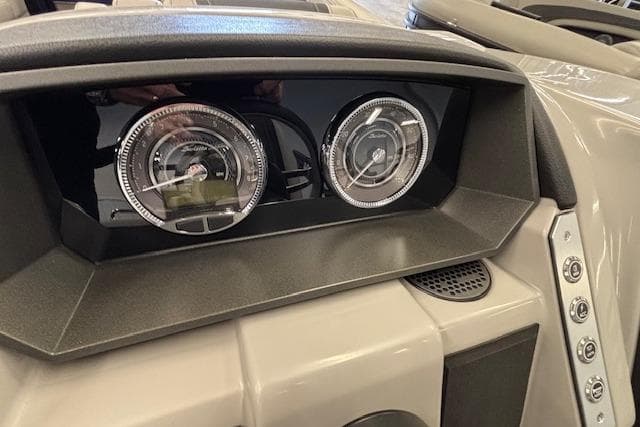 Dashboard of 2026 Barletta Corsa 23UC boat with modern gauges and controls.
