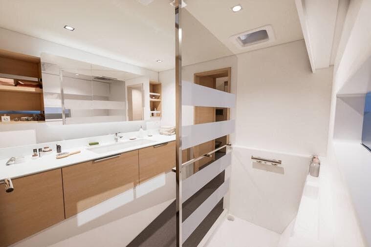 Luxurious bathroom interior of 2026 Fountaine Pajot FP48 Catamaran with modern fixtures.