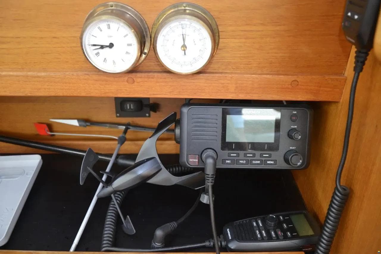 Nauticat 32 (1991) yacht interior with navigation instruments and communication devices.
