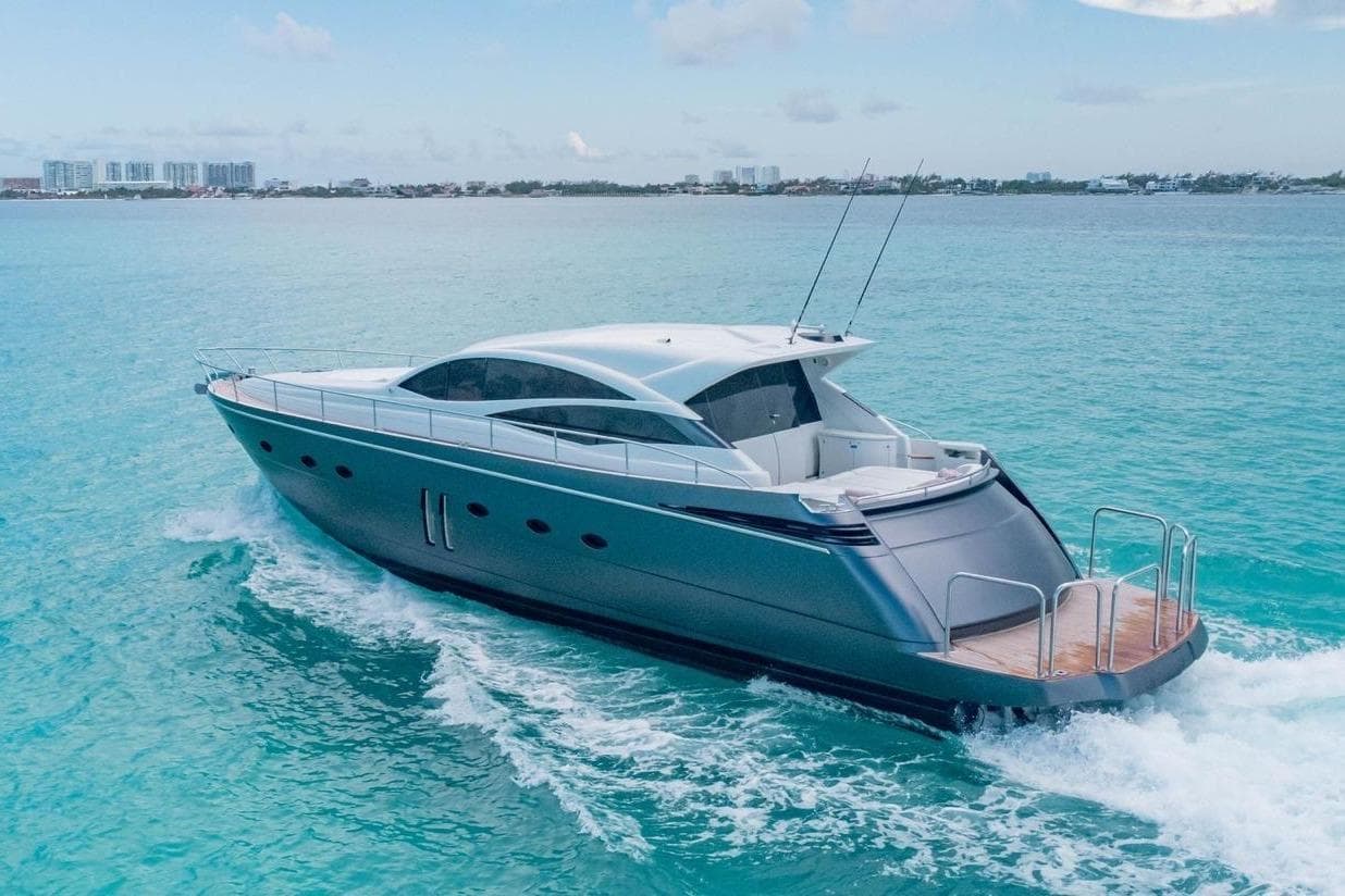 2007 Pershing 62 yacht cruising on clear blue ocean waters.