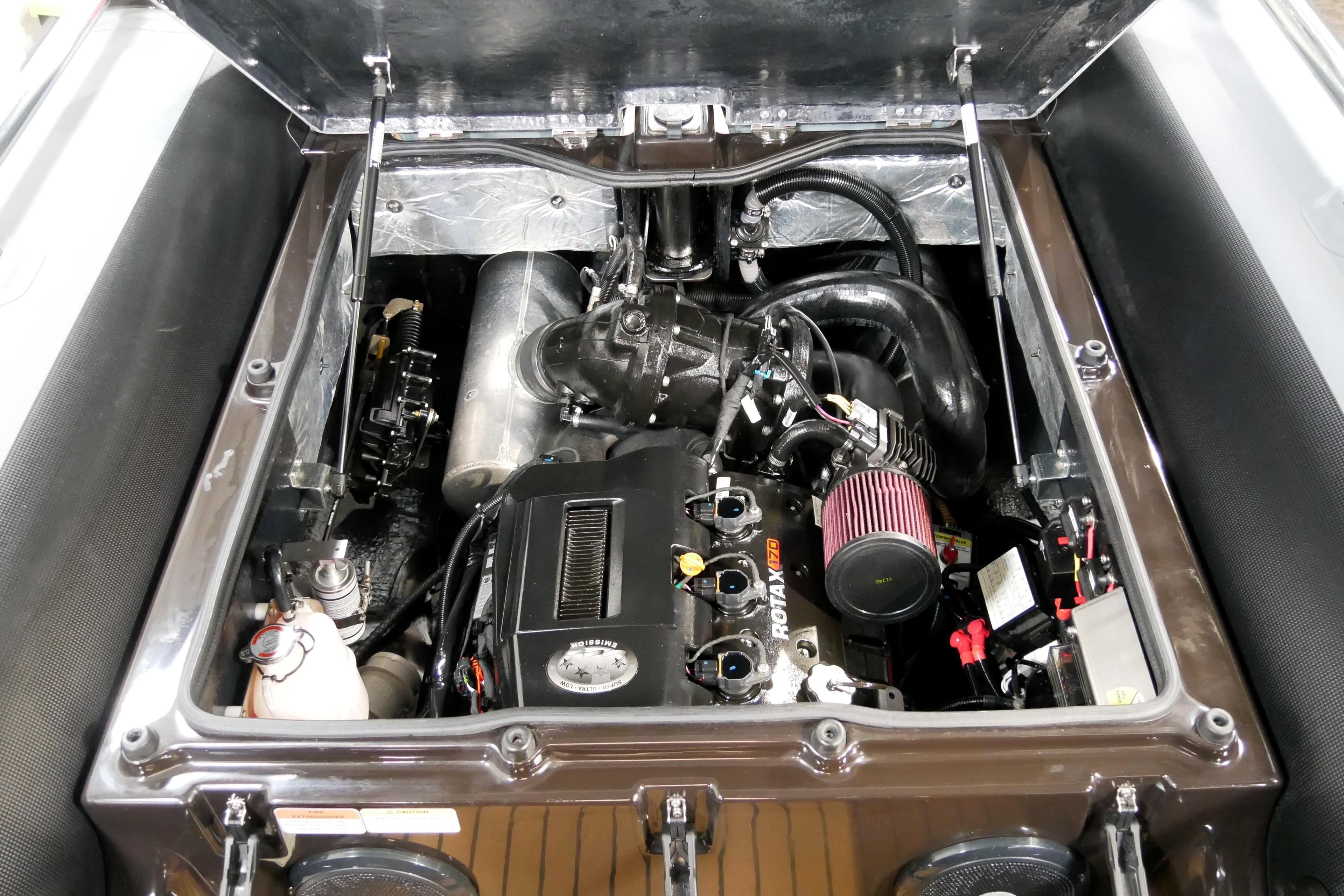 Engine compartment of a 2021 Williams Jet Tenders Sportjet 520, showcasing Rotax engine components.