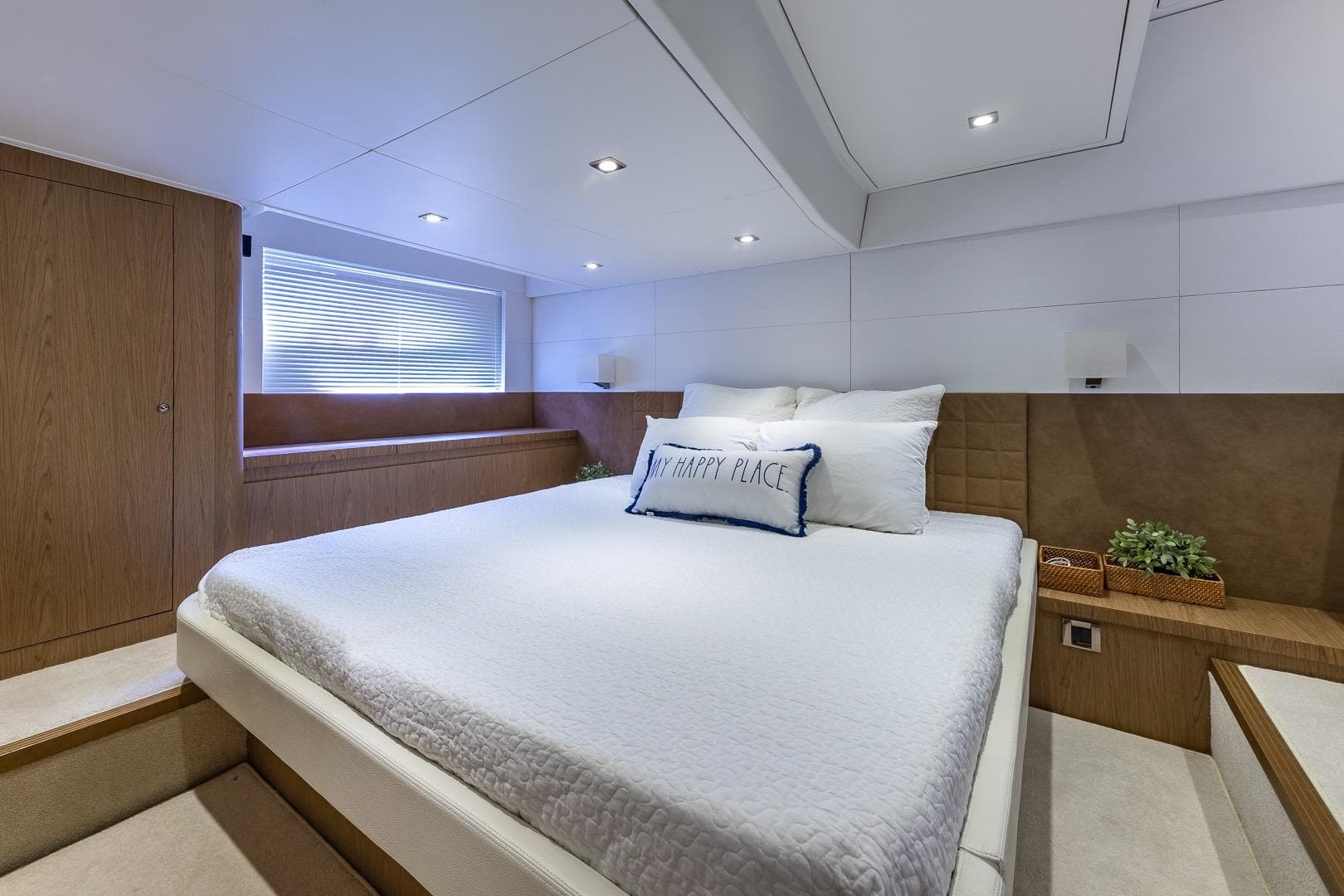 Luxurious bedroom interior of 2011 Beneteau Gran Turismo 49 Fly yacht.