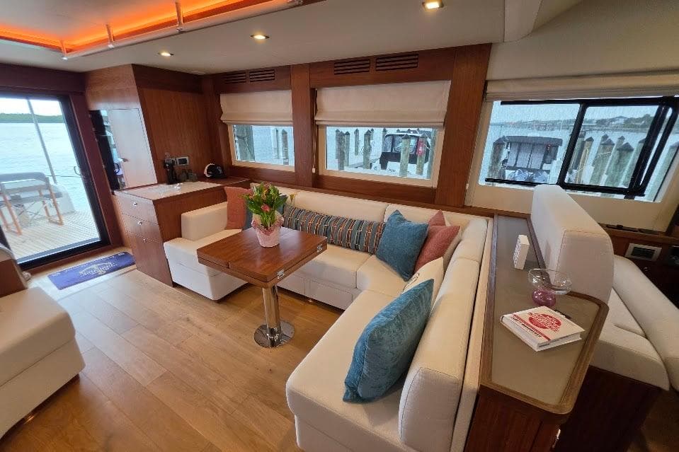 Luxurious interior of 2024 Sirena 58 Flybridge MY yacht with elegant seating and decor.