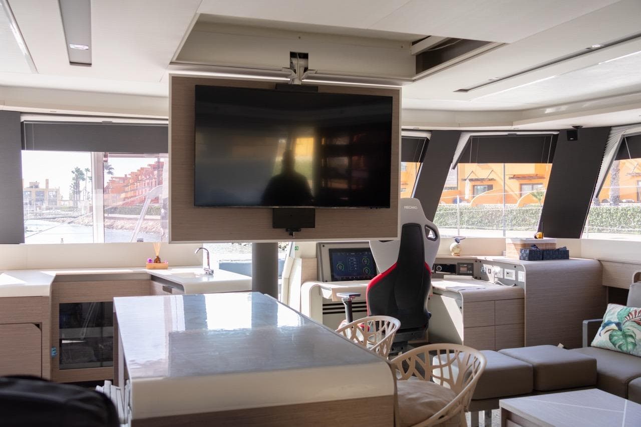 Luxurious interior of 2023 Fountaine Pajot Samana 59 yacht with modern amenities and sleek design.