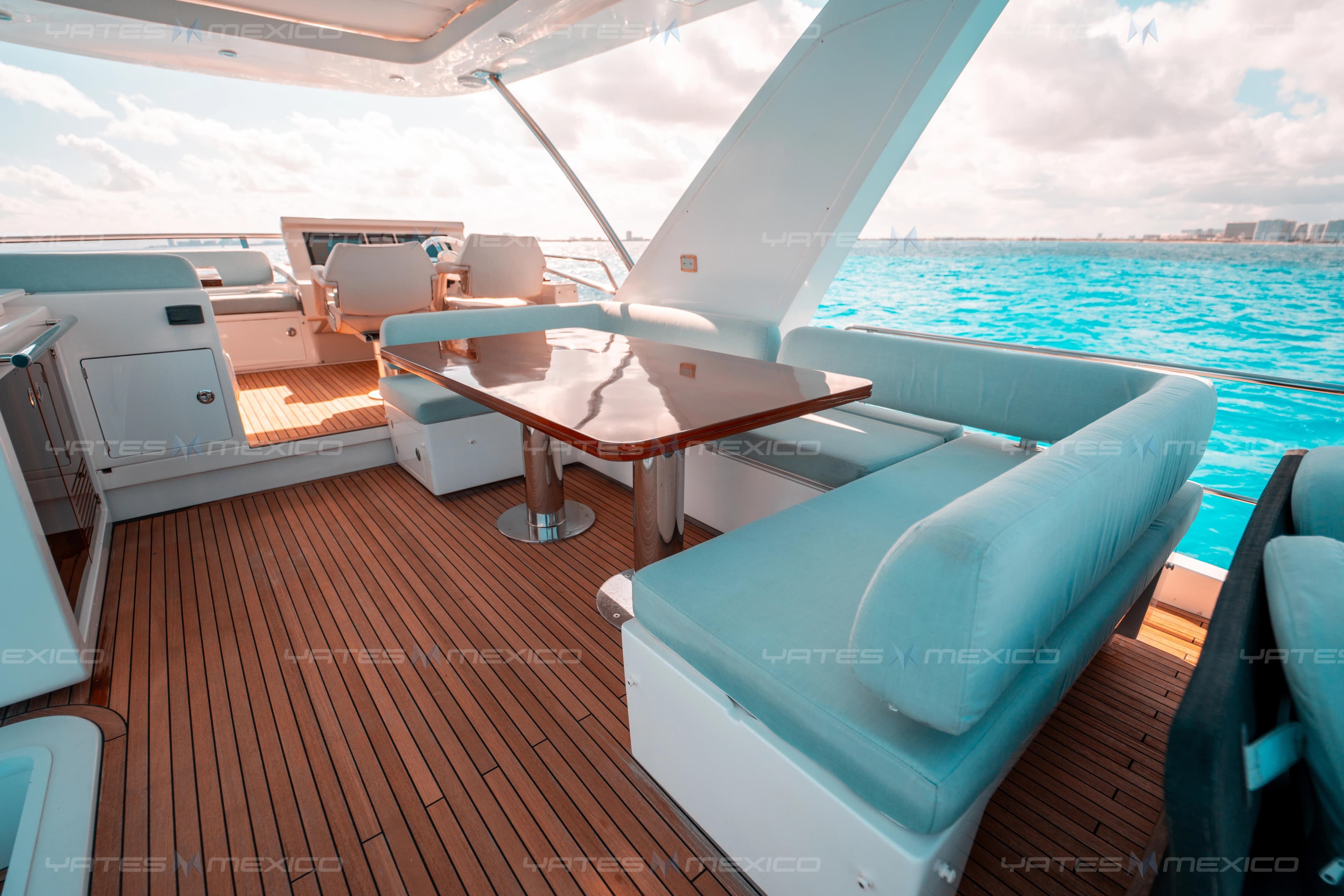 Luxurious 2017 Azimut 66 yacht interior with elegant seating and ocean view.