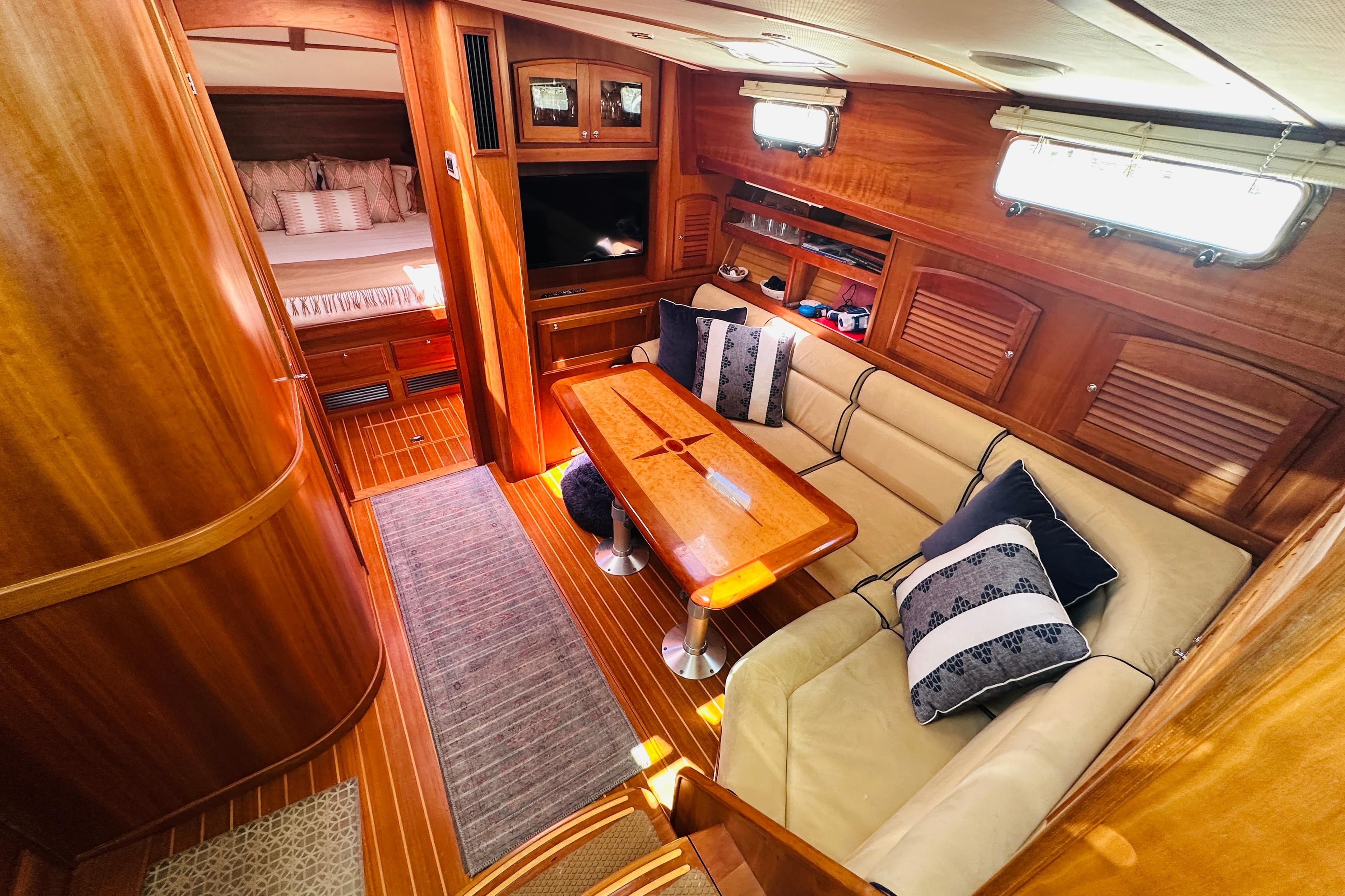 Luxurious interior of 2006 Sabre 38 Hard Top Express yacht with elegant wood finish.