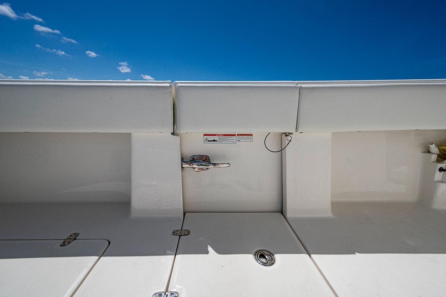 2023 SeaVee 390B boat deck with clear blue sky background.