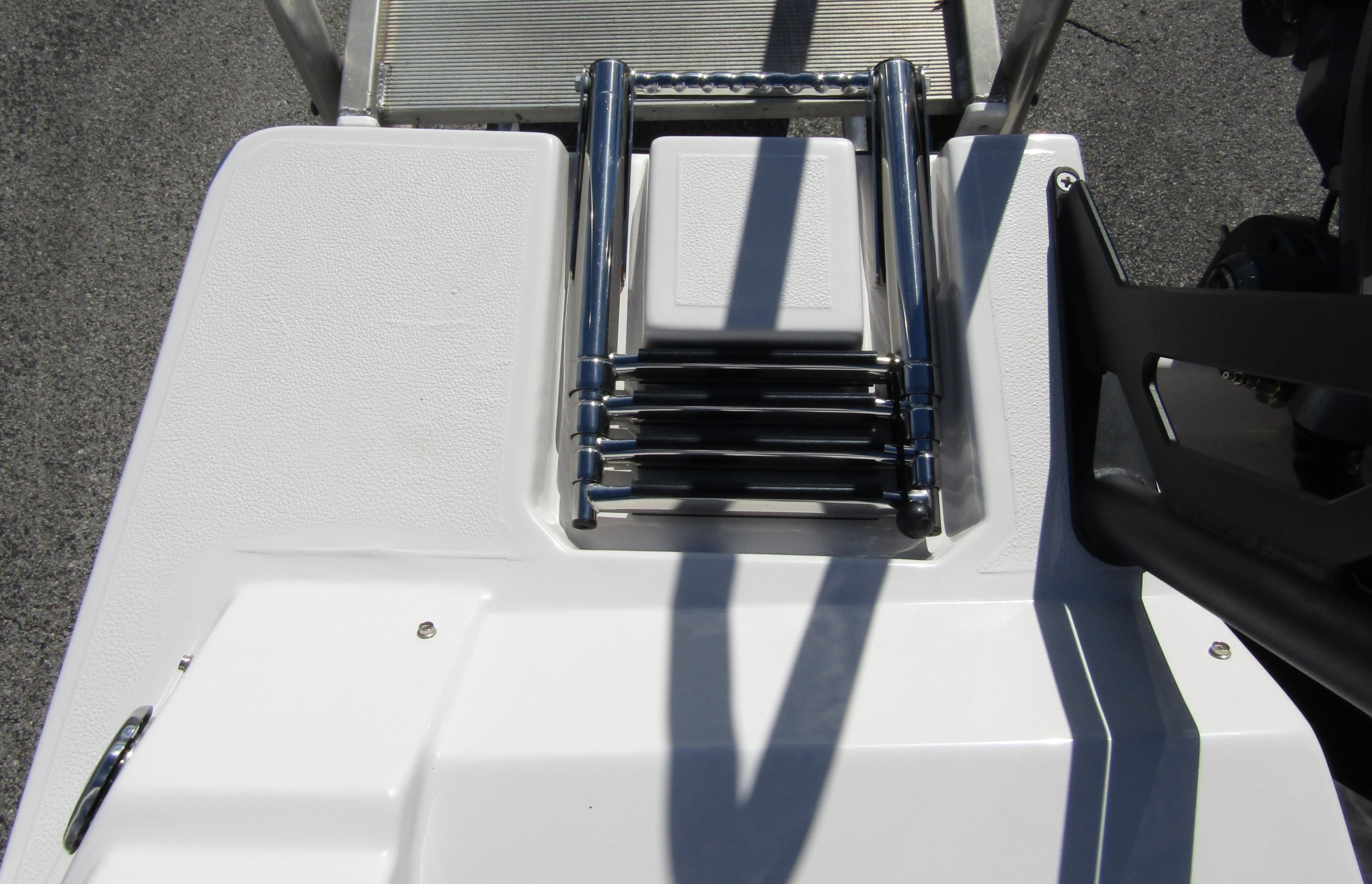 2024 Starcraft SVX 191 OB CC boat with a stainless steel swim ladder.