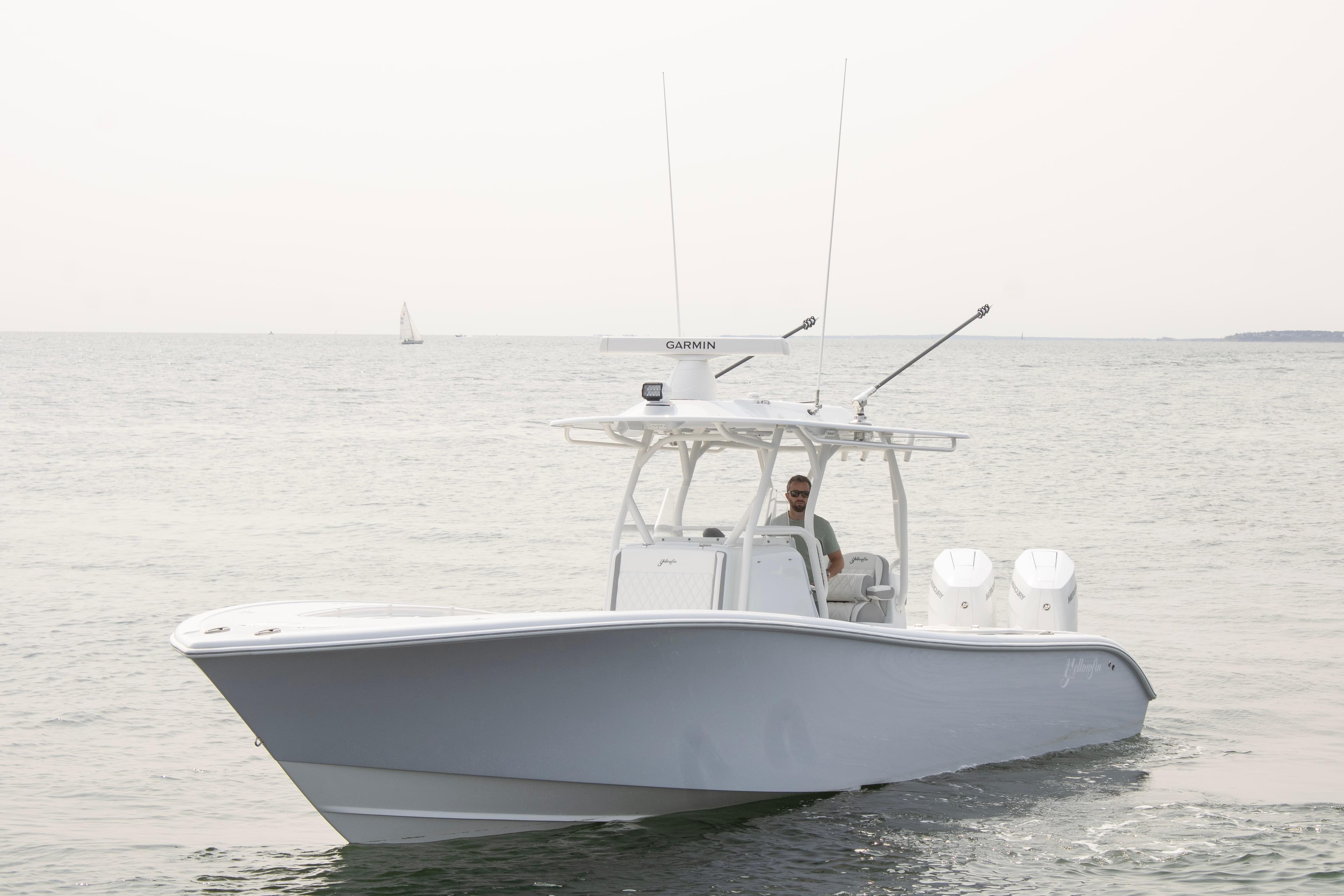 2025 Yellowfin 32 Offshore boat cruising on open water.