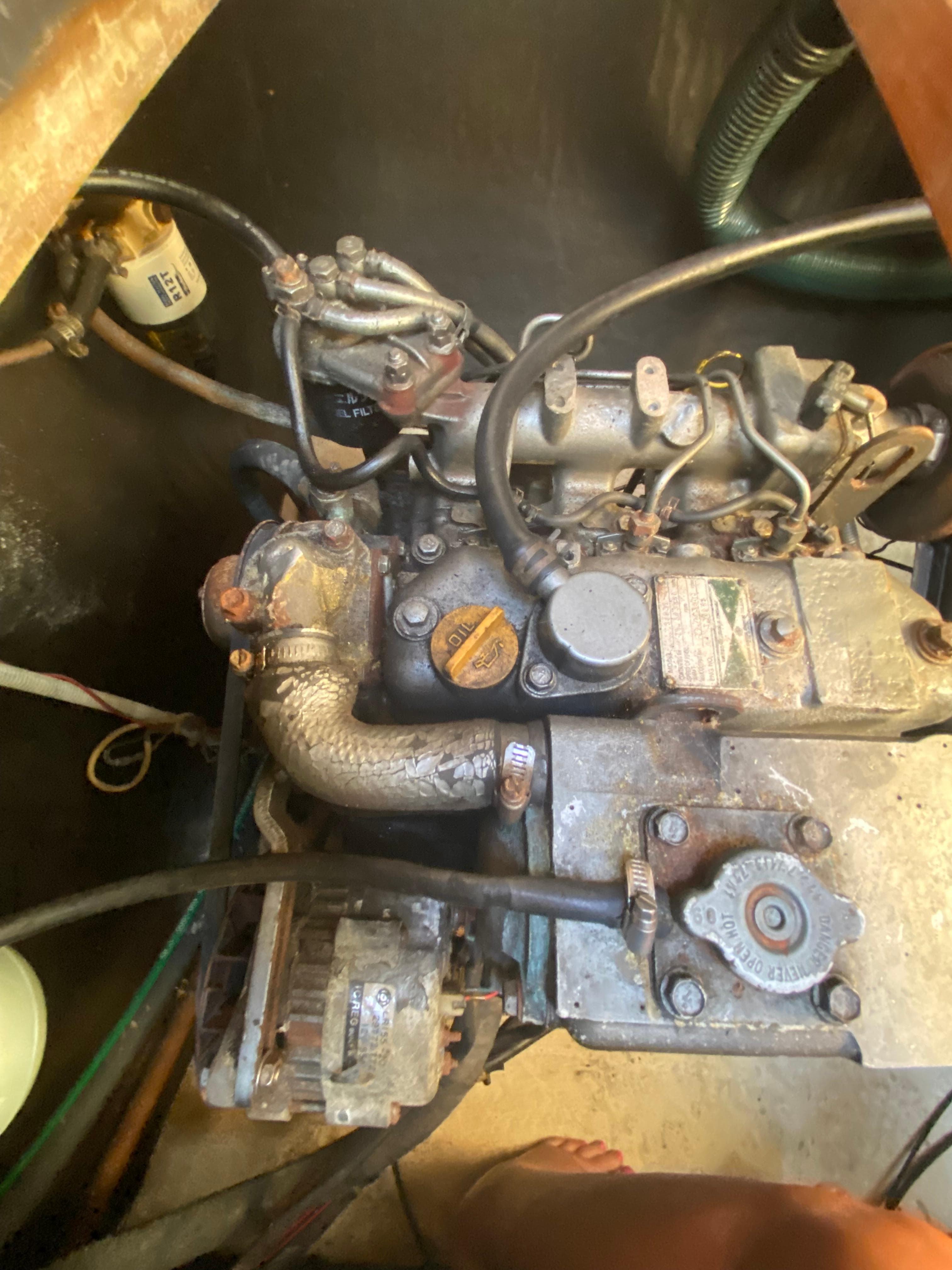 Engine compartment of a 1998 Fountaine Pajot Bahia 46 catamaran, showing mechanical components.