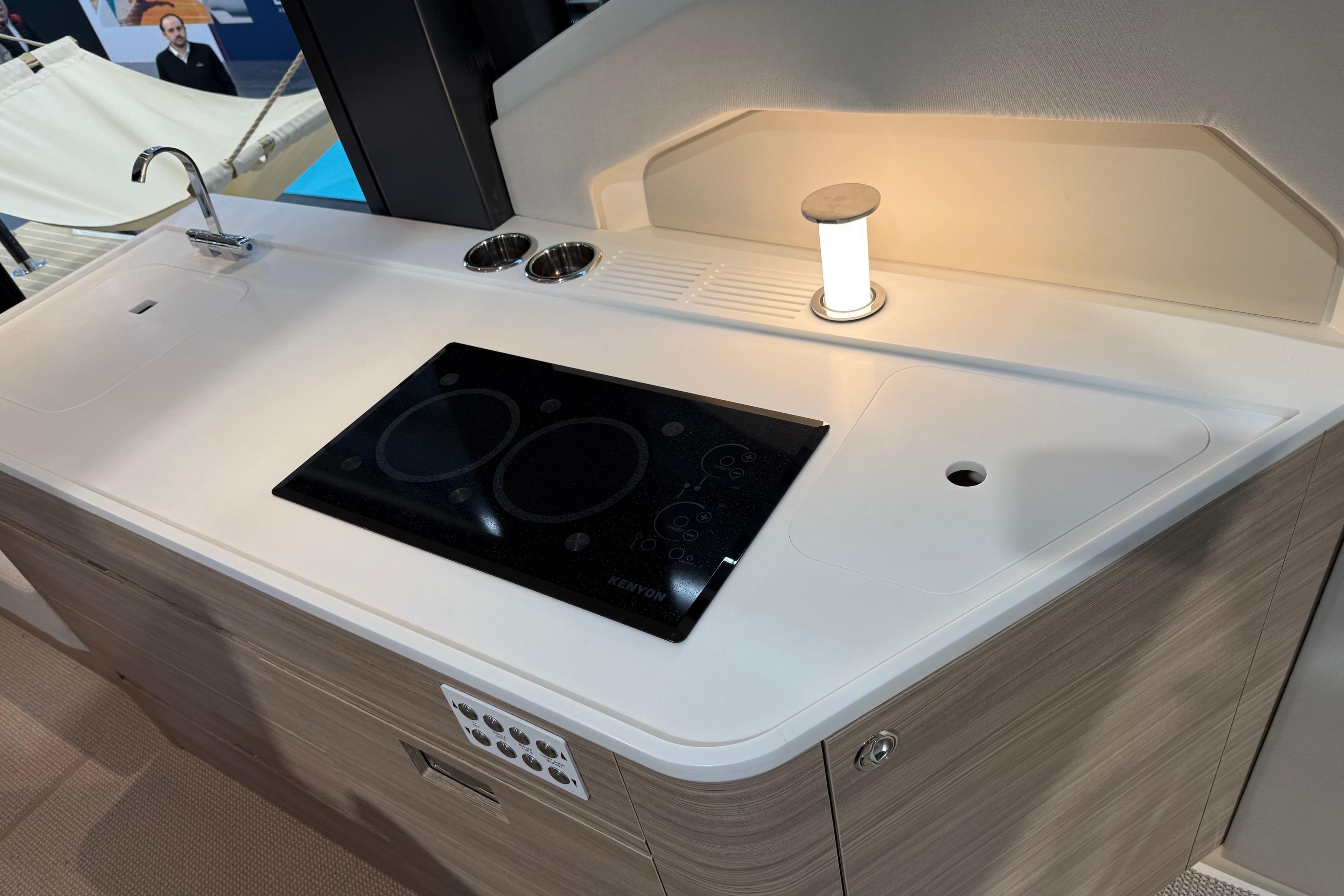 Modern kitchen area on 2026 Saxdor 460 GTC yacht with stove and sink.