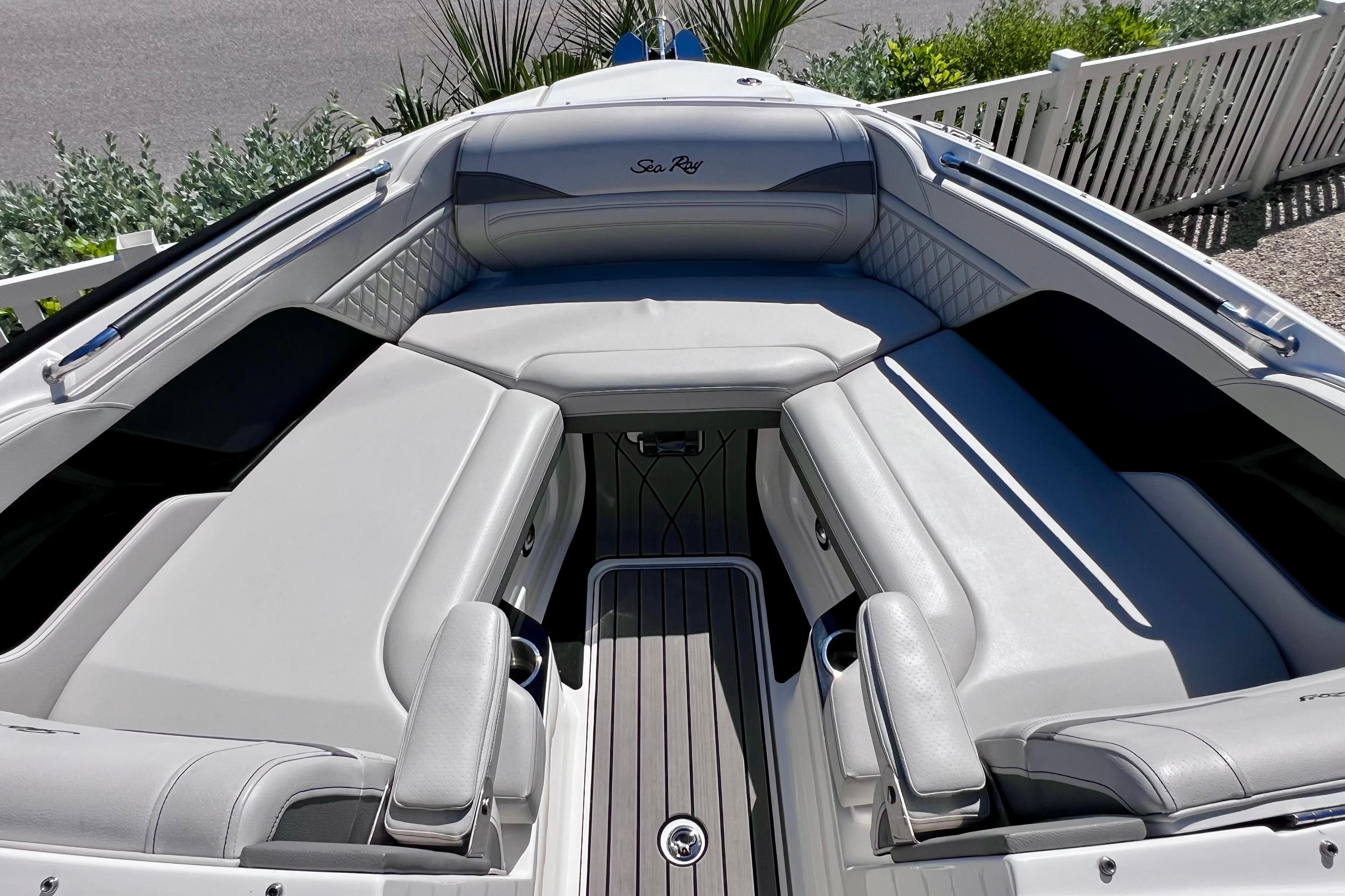 2024 Sea Ray SLX 260 Outboard boat interior with luxurious seating and sleek design.