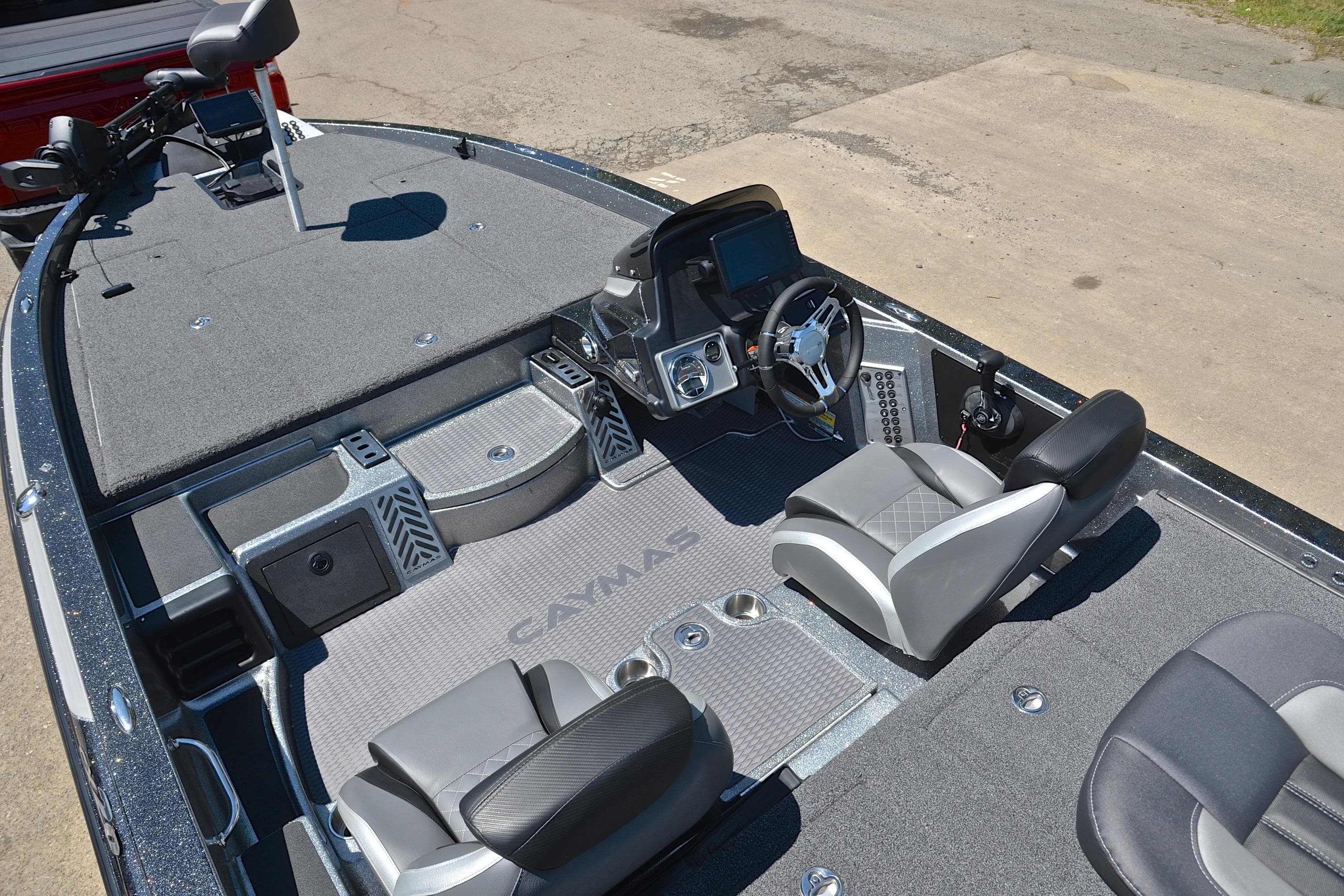 2022 Caymas CX 20 boat interior with dual seats and modern dashboard.