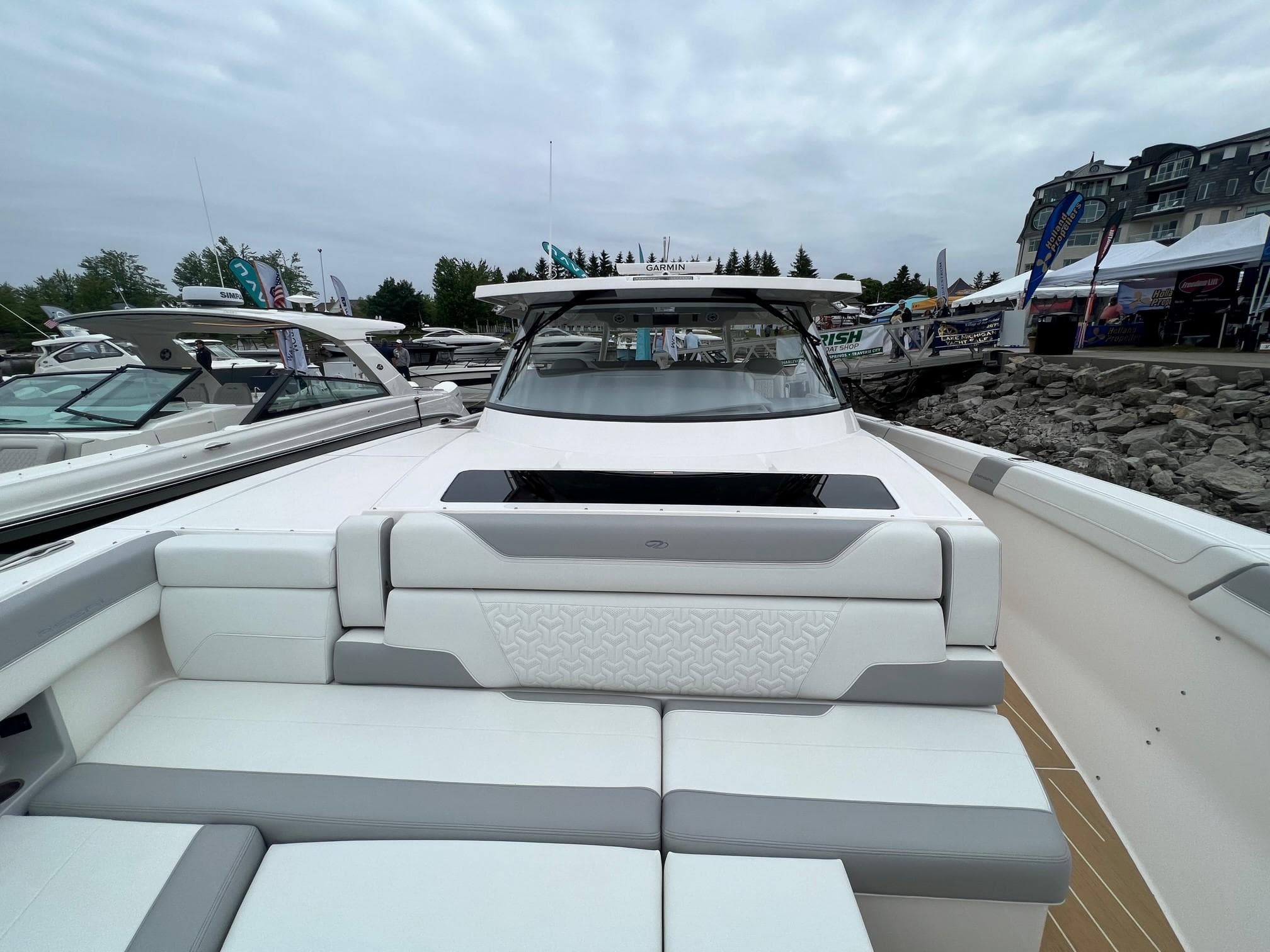 2026 Regal 50 SAV luxury boat with sleek design at a marina.