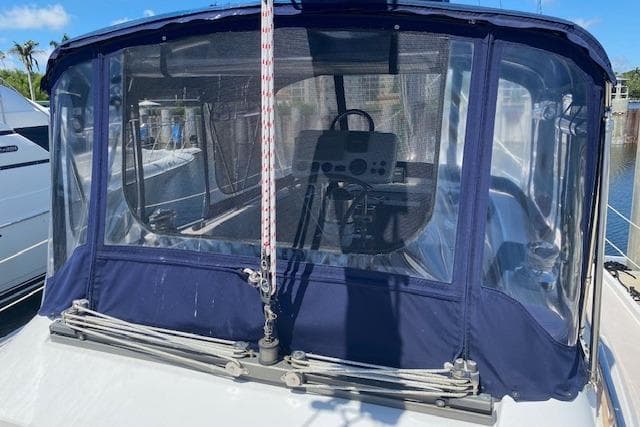 2003 Morgan/Catalina 381 CC sailboat cockpit with blue canvas enclosure.