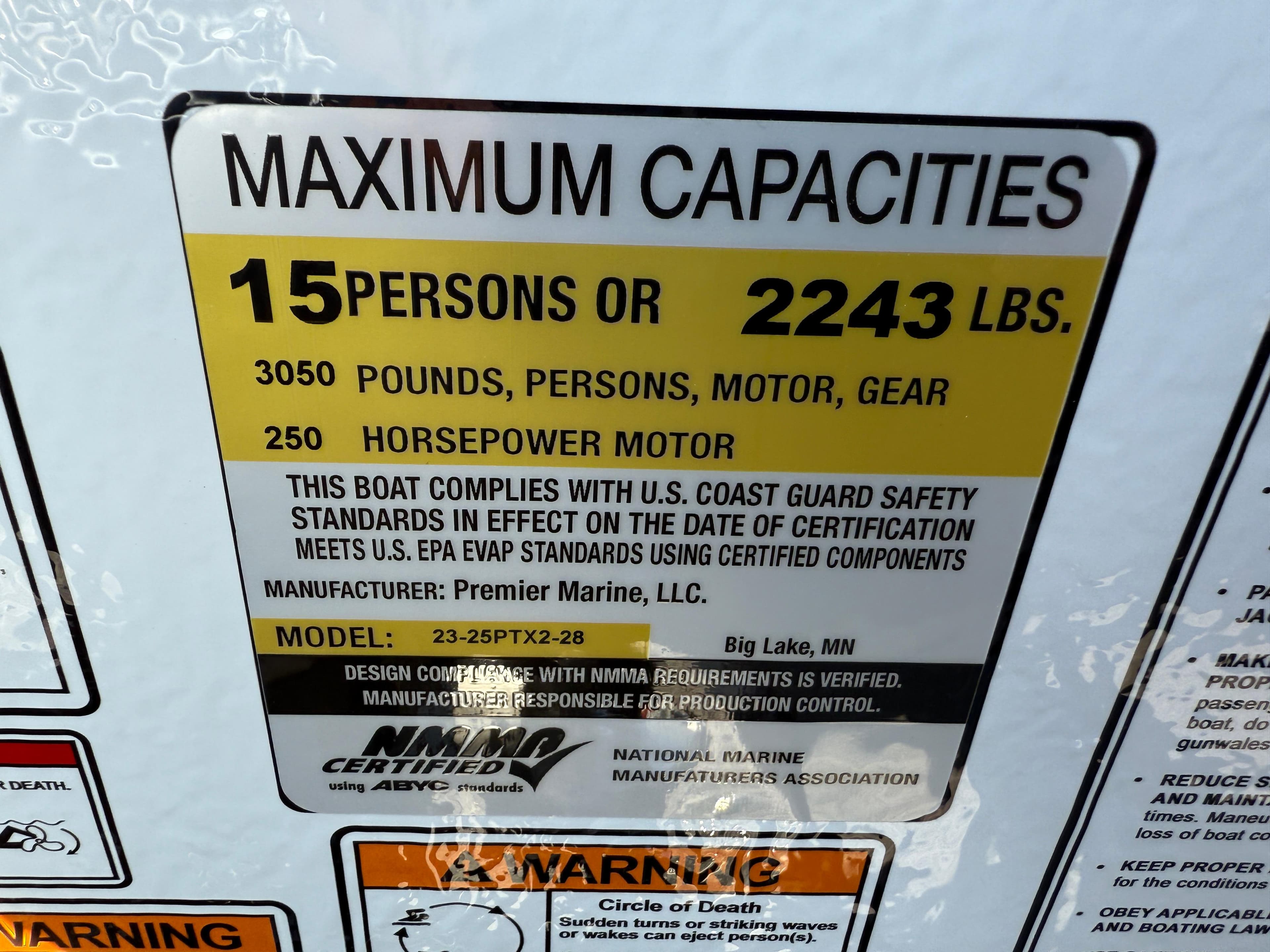 Maximum capacity sign for Premier 230 Solaris RL, 2025 model, 15 persons or 2243 lbs.