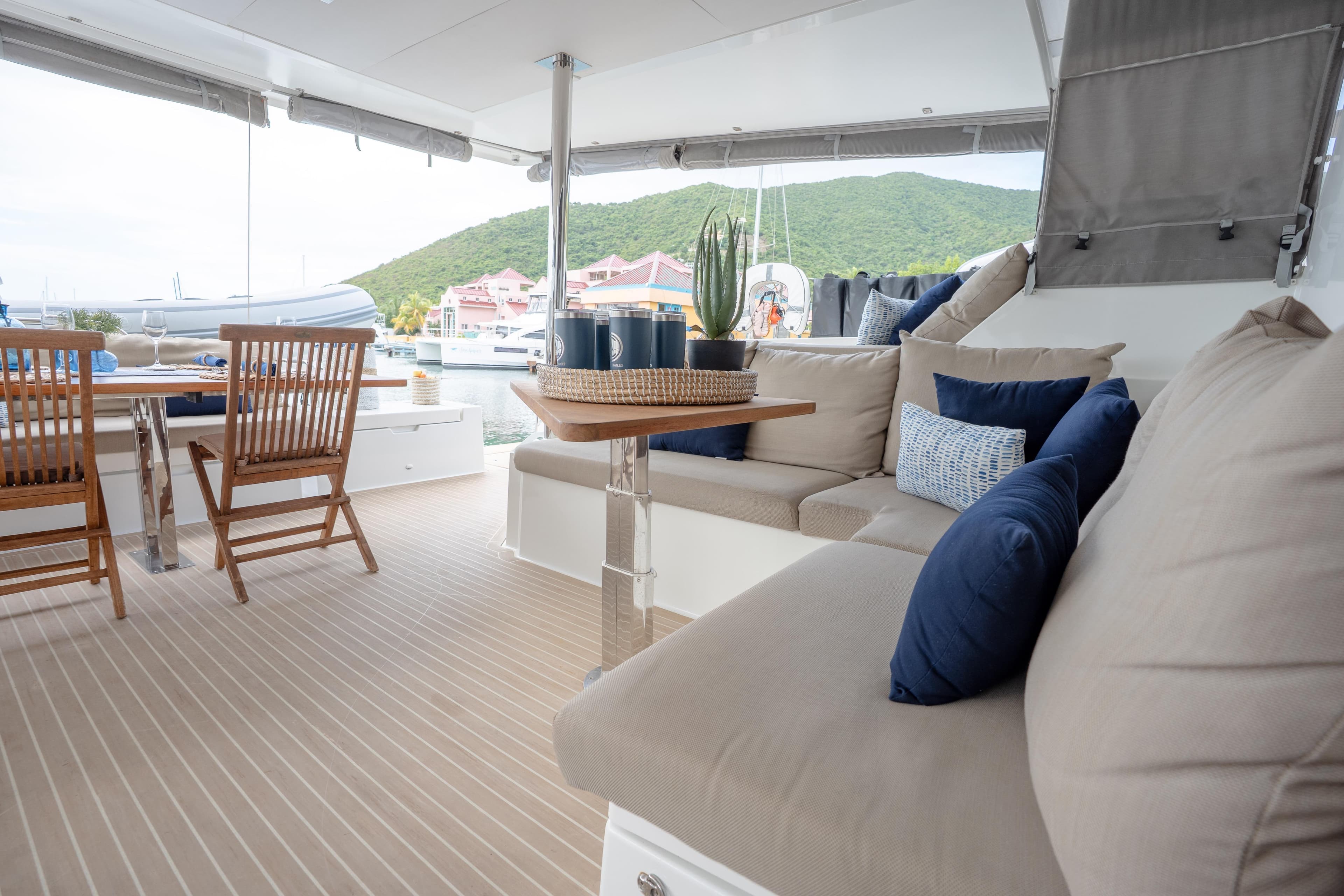 Luxurious 2019 Fountaine Pajot Ipanema 58 yacht interior with elegant seating and dining area.