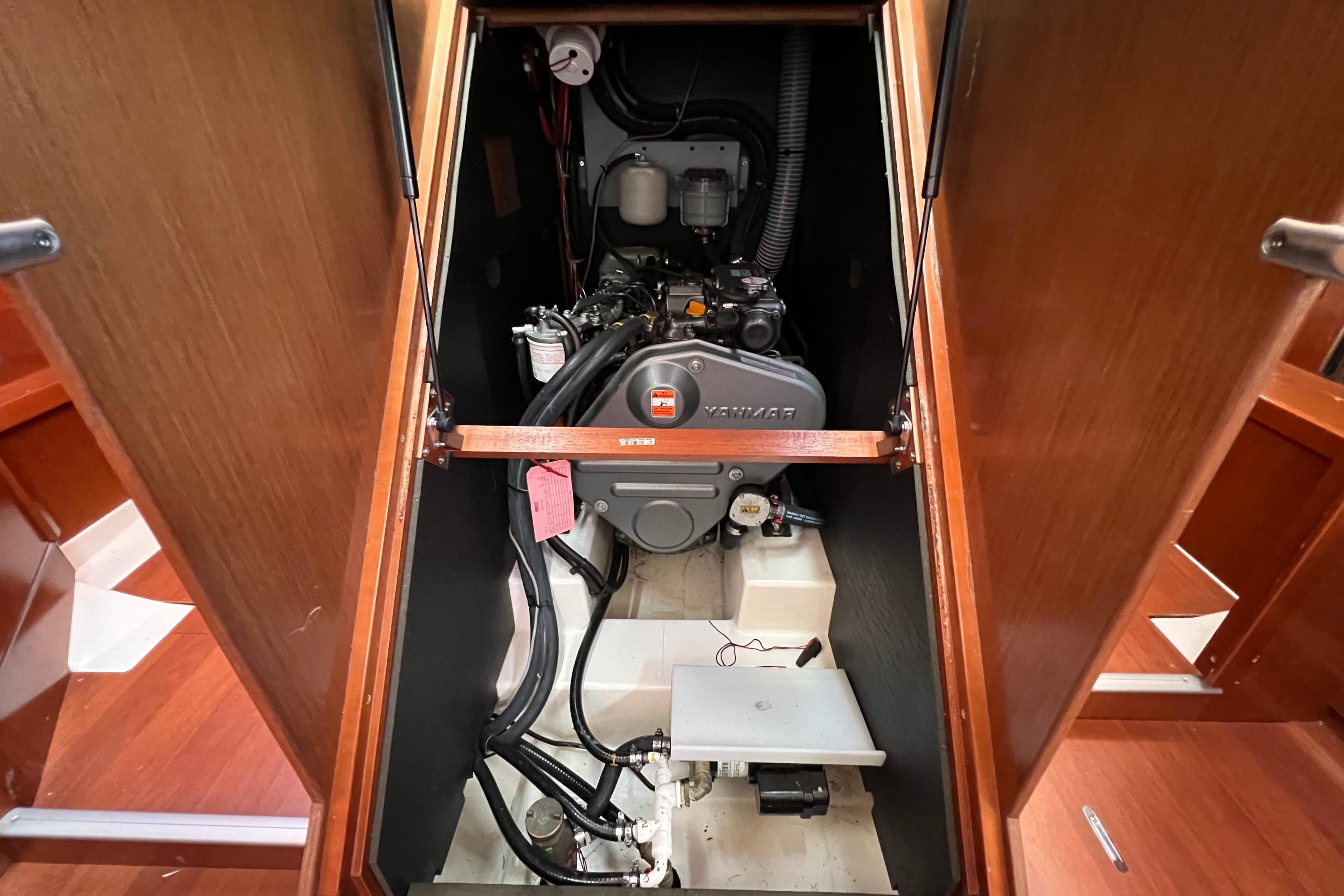 Engine compartment of 2012 Beneteau Oceanis 45 sailboat, featuring a Yanmar engine.