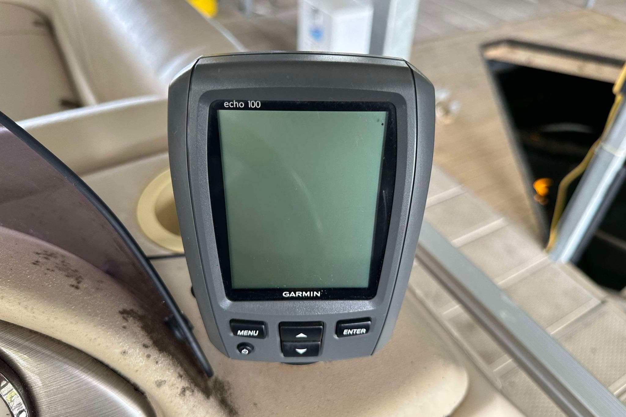 Garmin Echo 100 fishfinder on 2013 SunCatcher V322 RC boat dashboard.