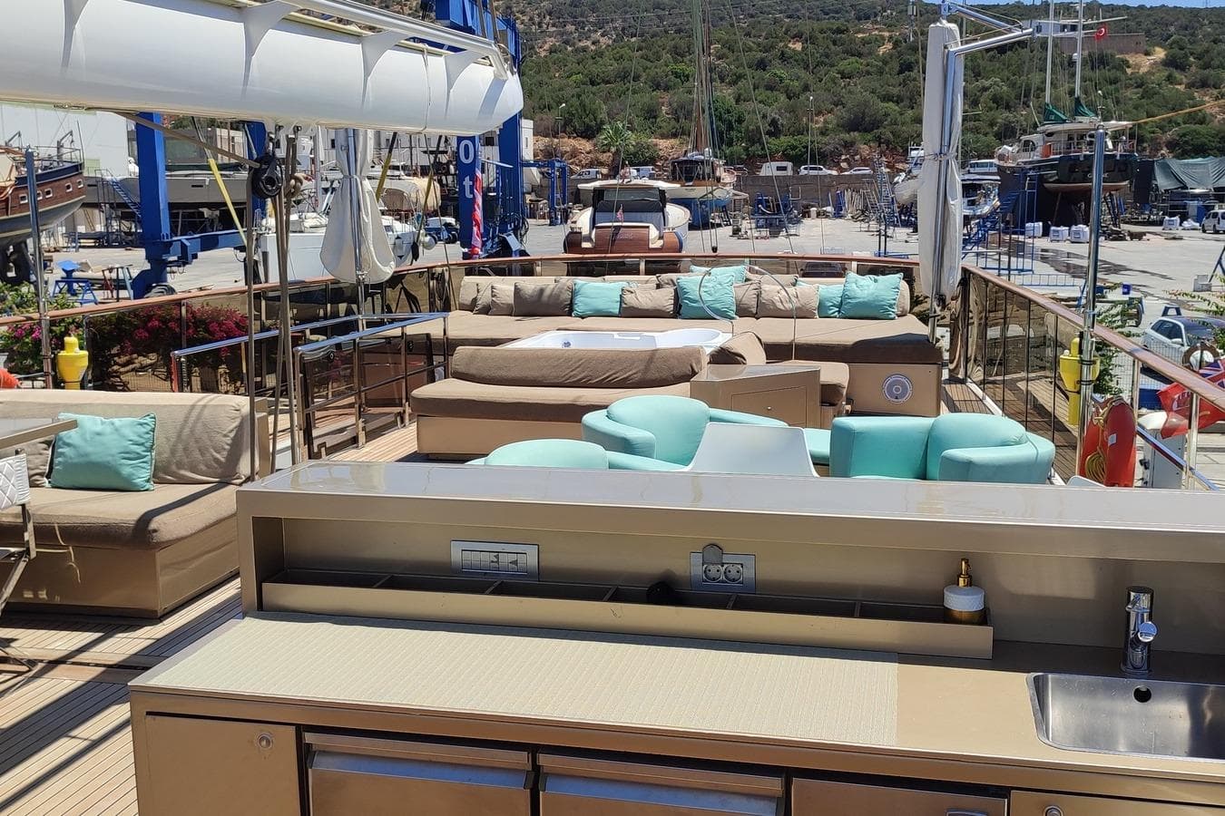 Luxurious deck of 2009 Aganlar Custom Built Gulet 34M with comfortable seating and outdoor amenities.