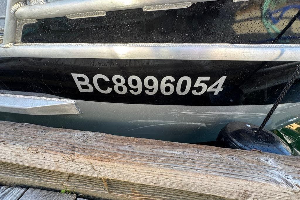 2023 Boulton VOYAGER PRO boat with registration BC8996054 docked.