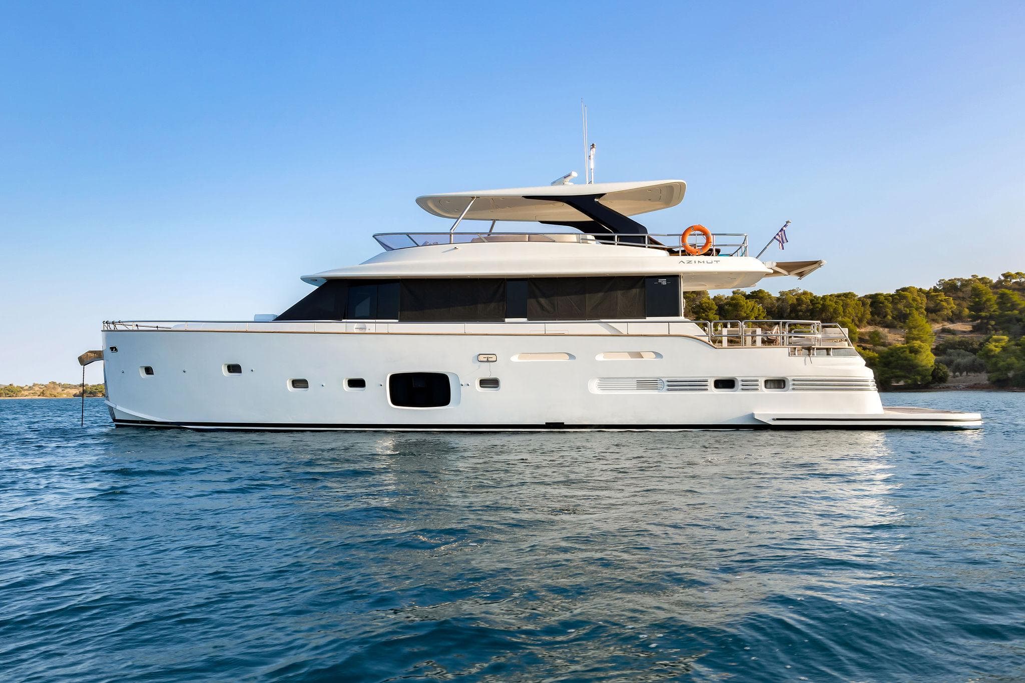 2016 Azimut Magellano 76 yacht on calm waters.