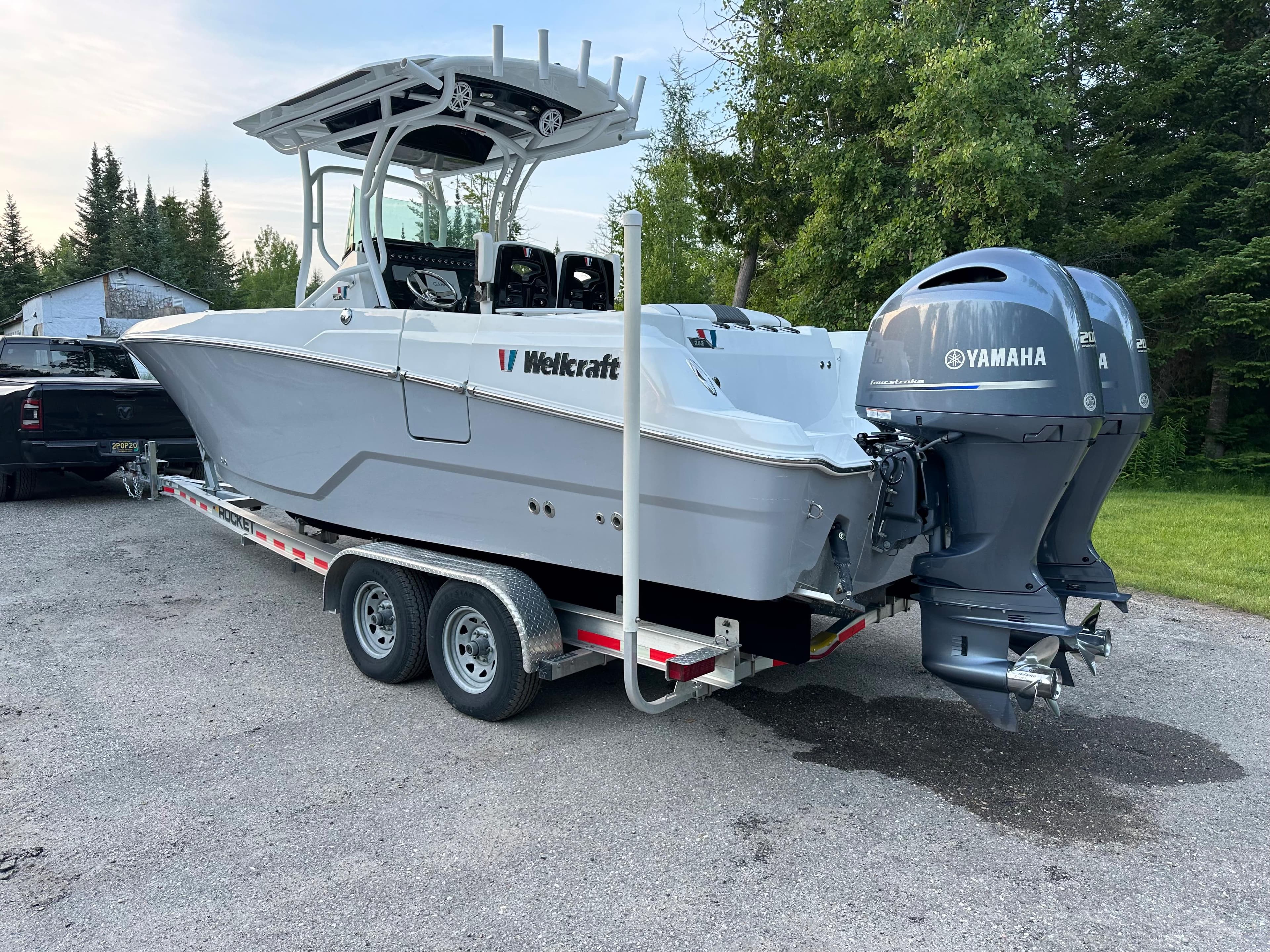 2021 Wellcraft 262 Fisherman boat on trailer with Yamaha outboard motor.