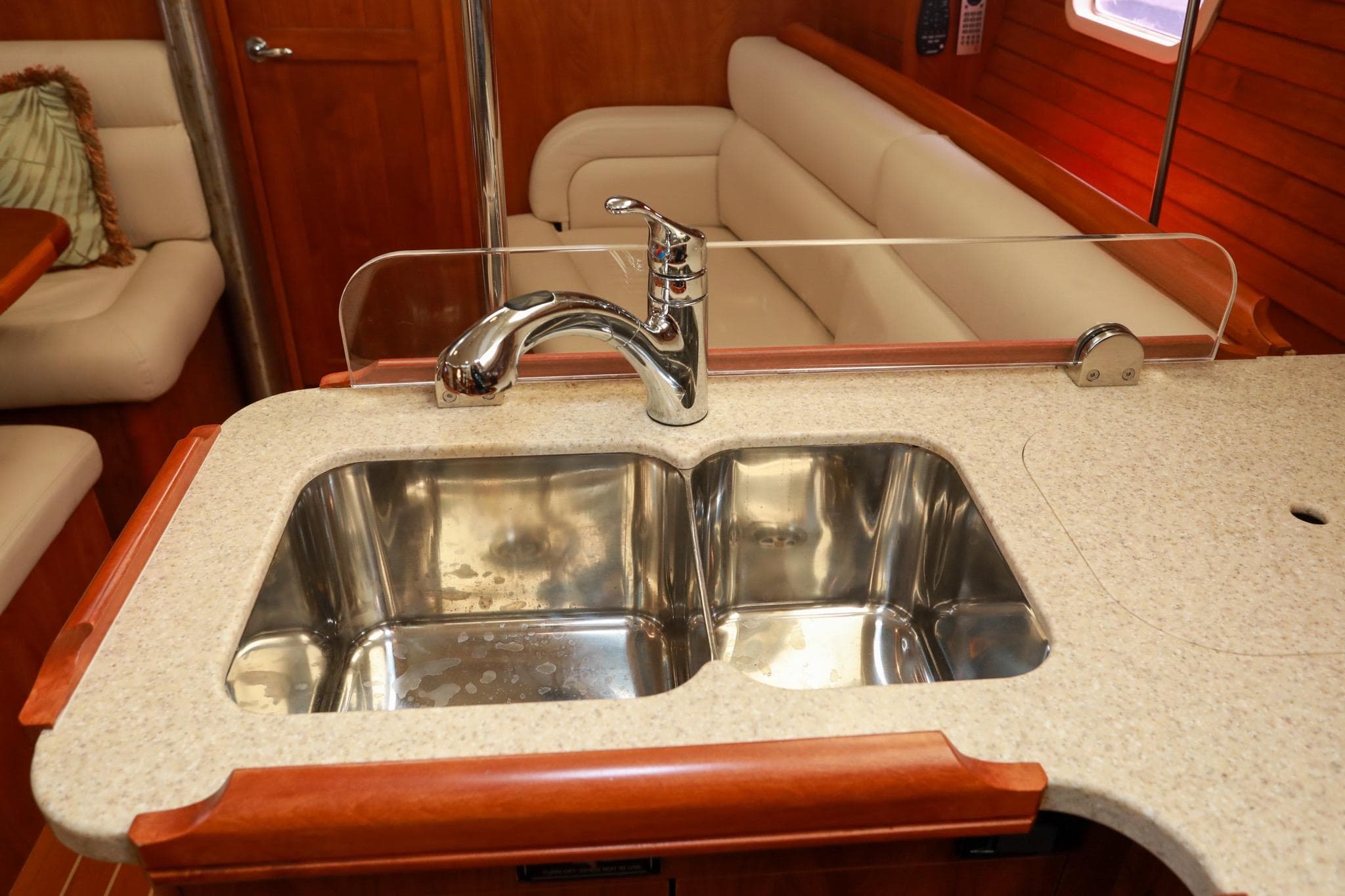 Luxurious kitchen sink in 2009 Hunter 45 Center Cockpit yacht interior.