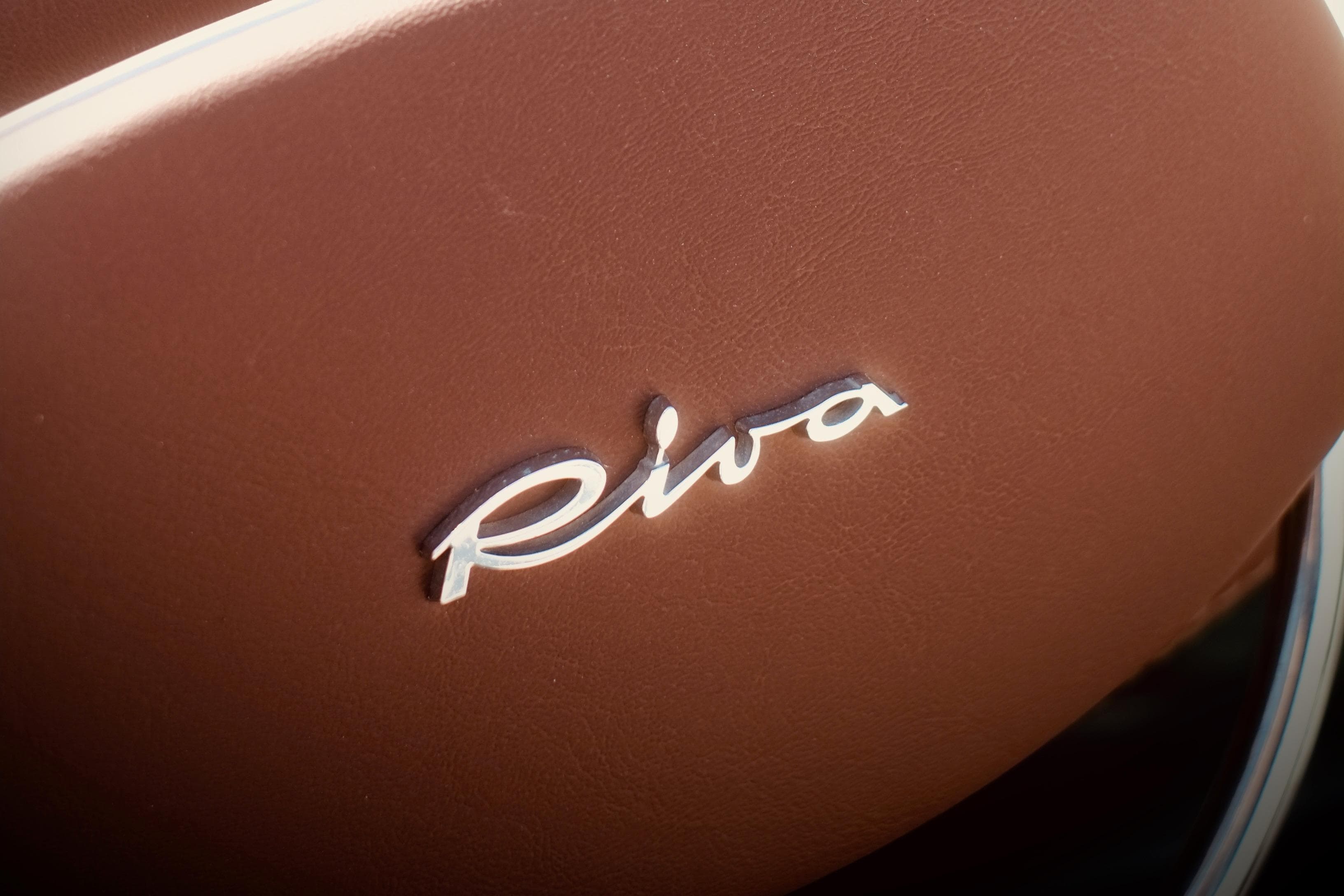 Riva Aquariva 33 logo on brown leather, 2003 model boat detail.