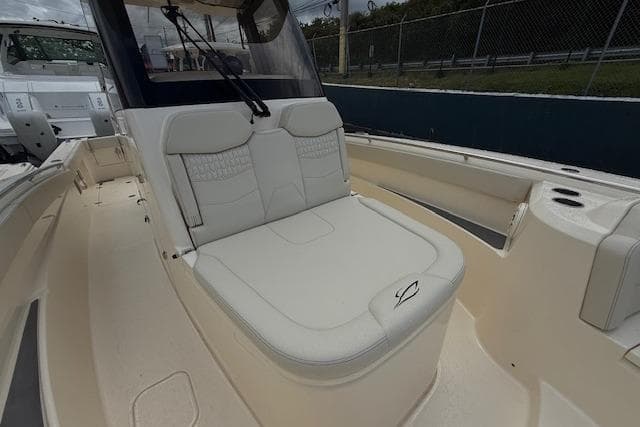 2026 Scout 288 LXF boat with luxurious seating and sleek design.