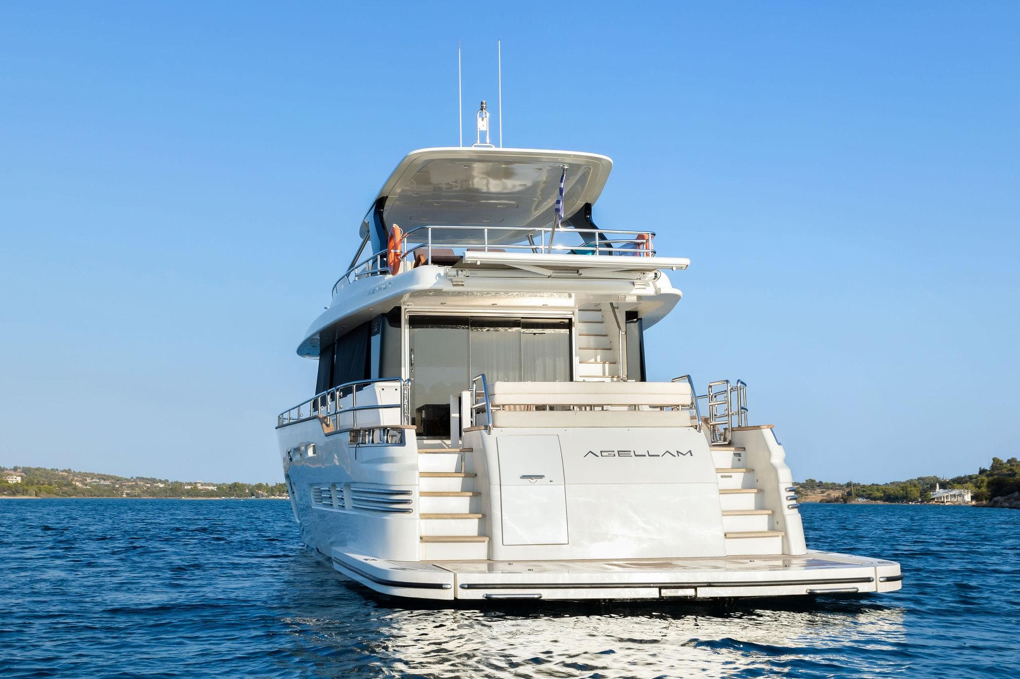 2016 Azimut Magellano 76 yacht on calm waters.
