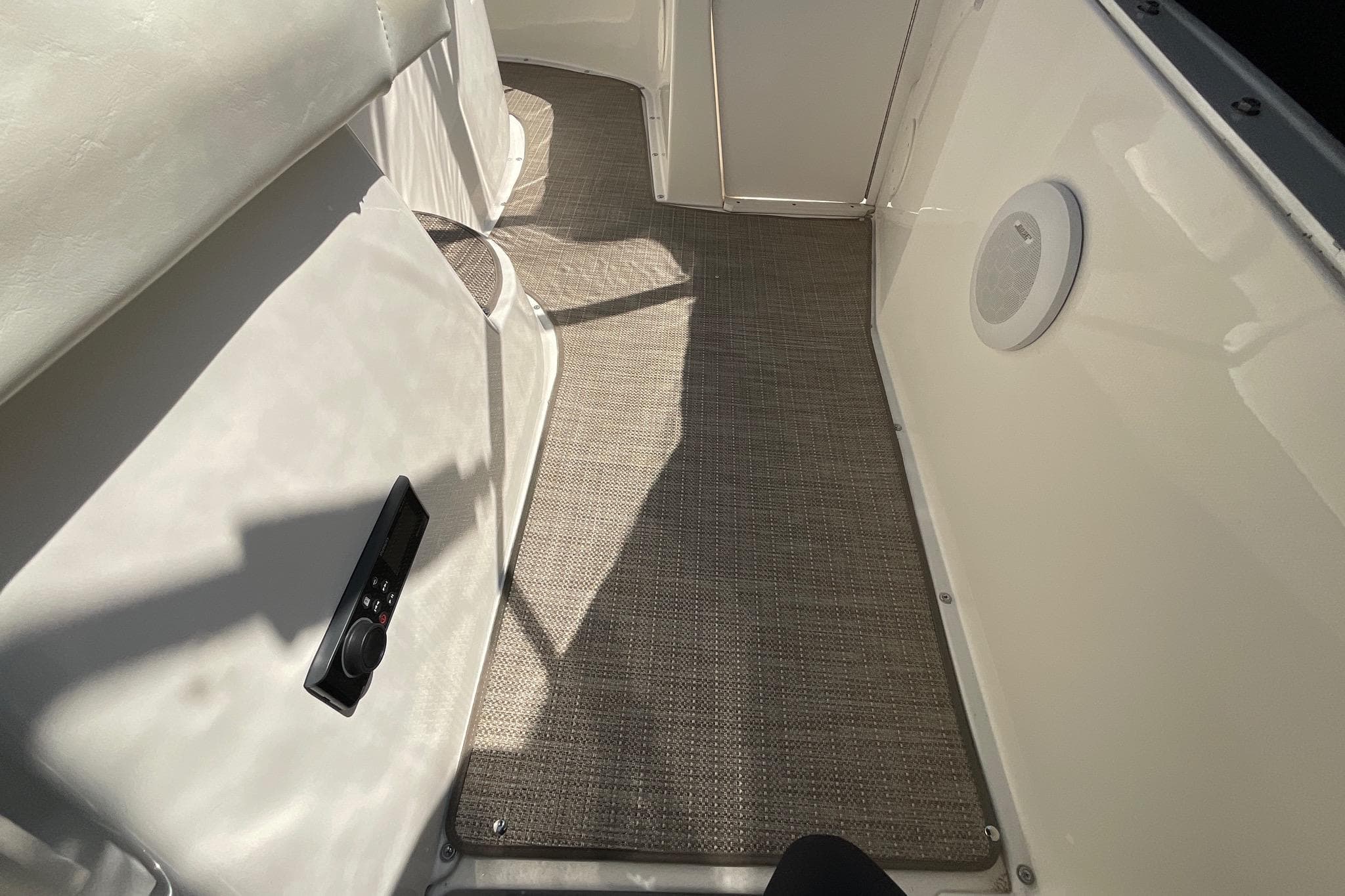 Interior view of a 2000 Silverton 392 Motor Yacht with carpeted flooring and speaker.