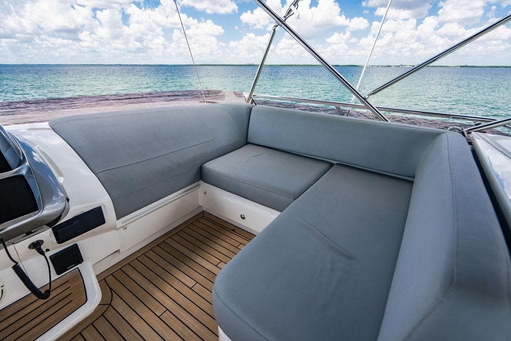Luxurious seating area on 2021 Princess S62 yacht with ocean view.