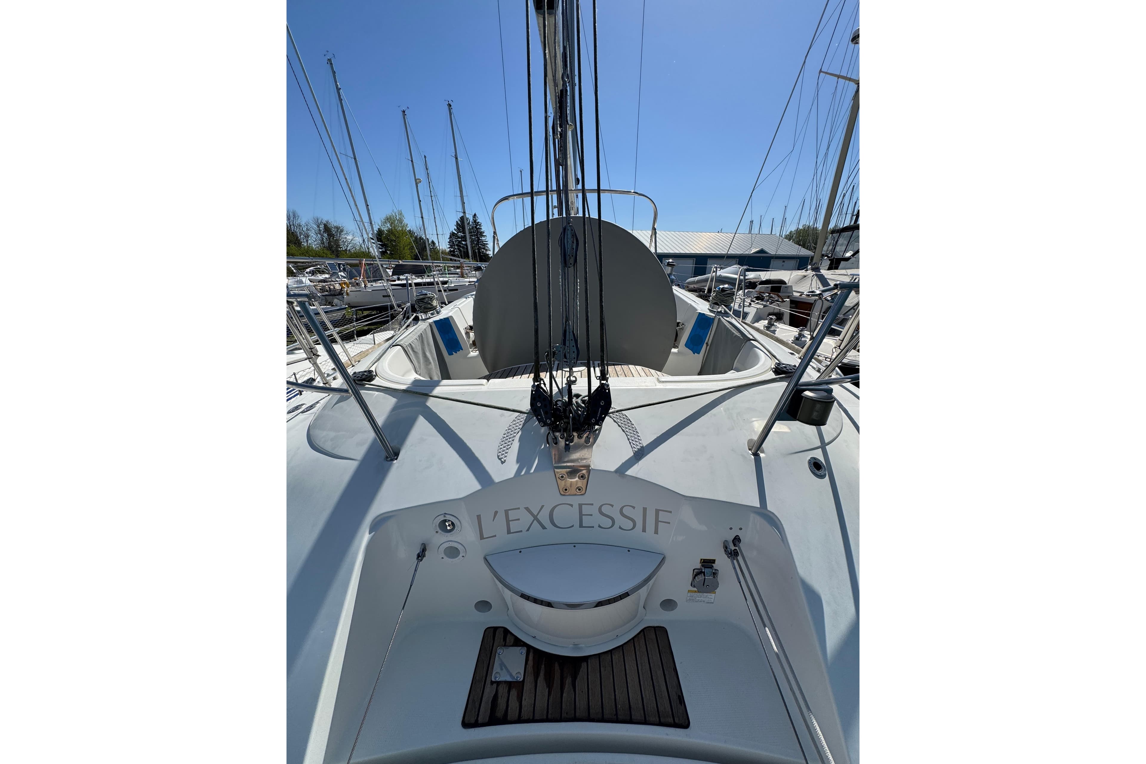 1996 Beneteau First 42s7 sailboat docked, showcasing deck and cockpit area.