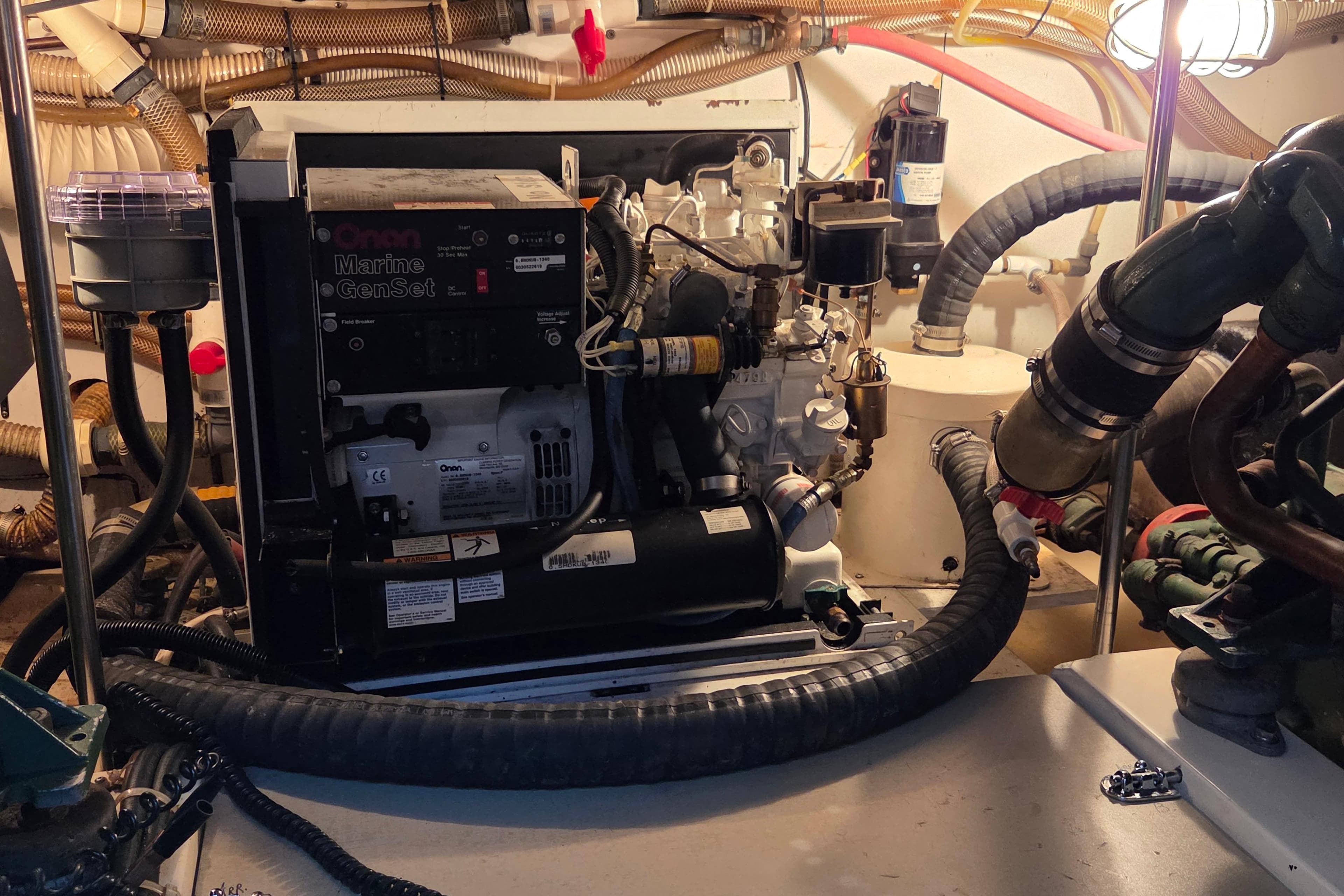 Engine room of a 1986 C&C CML 37 yacht with Onan Marine GenSet.