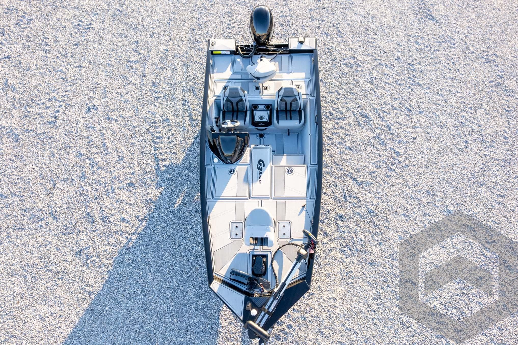 2026 G3 Sportsman 1810 SE boat, aerial view on gravel surface.